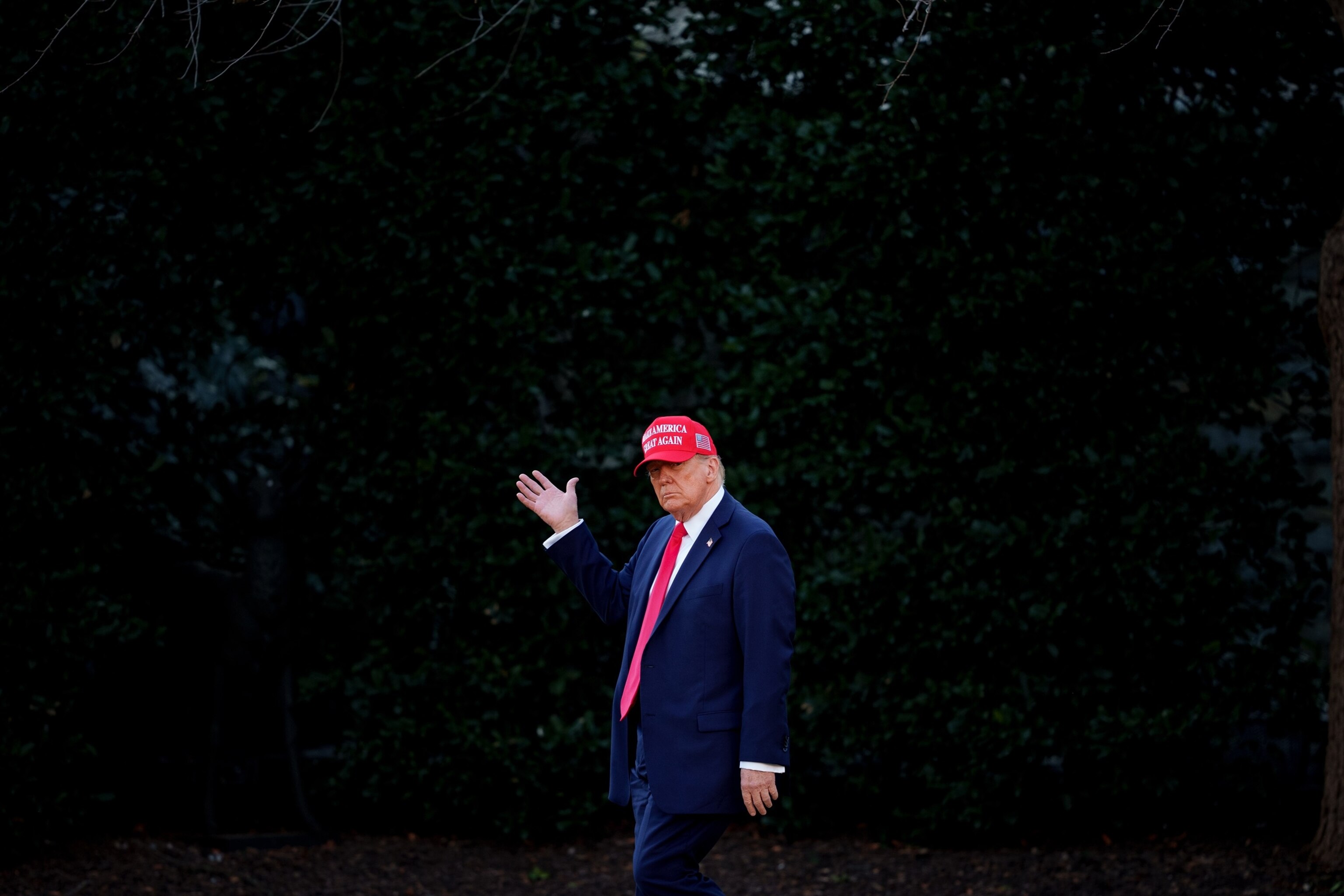 PHOTO: President Donald Trump waves to members of the media as he walks towards Marine One on the South Lawn of the White House on Feb. 28, 2025, in Washington.