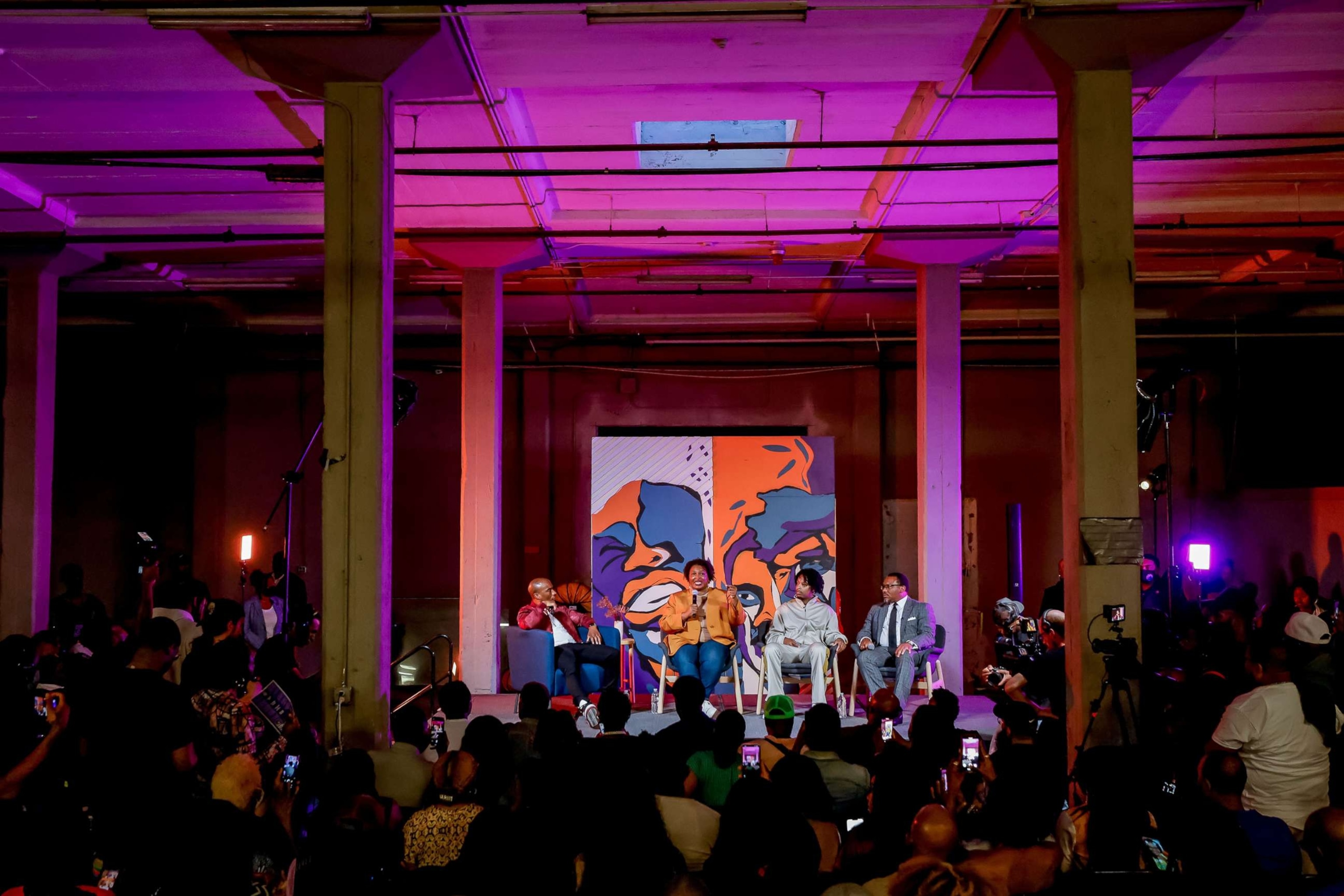 PHOTO: Georgia Democratic candidate for governor, Stacey Abrams, participates in a live streamed conversation with radio host "Charlamagne tha God", rapper "21 Savage" (2-R) and attorney Francys Johnson (R) in Atlanta, on Sept. 9, 2022.