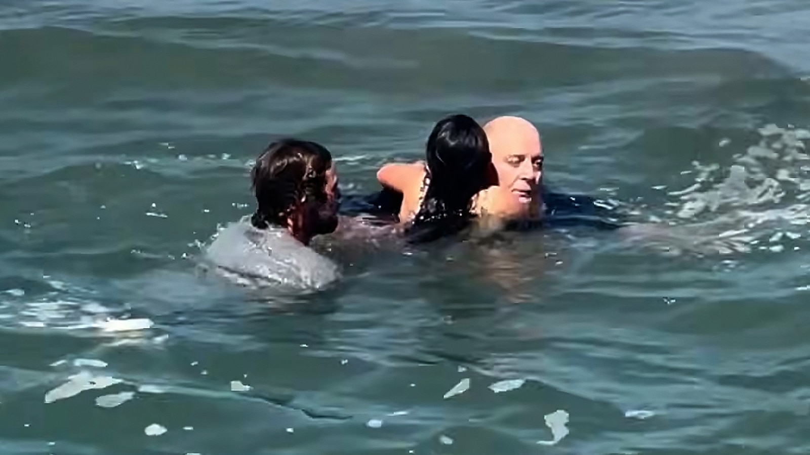 Surf coach speaks out after rescuing father, daughter from rip current