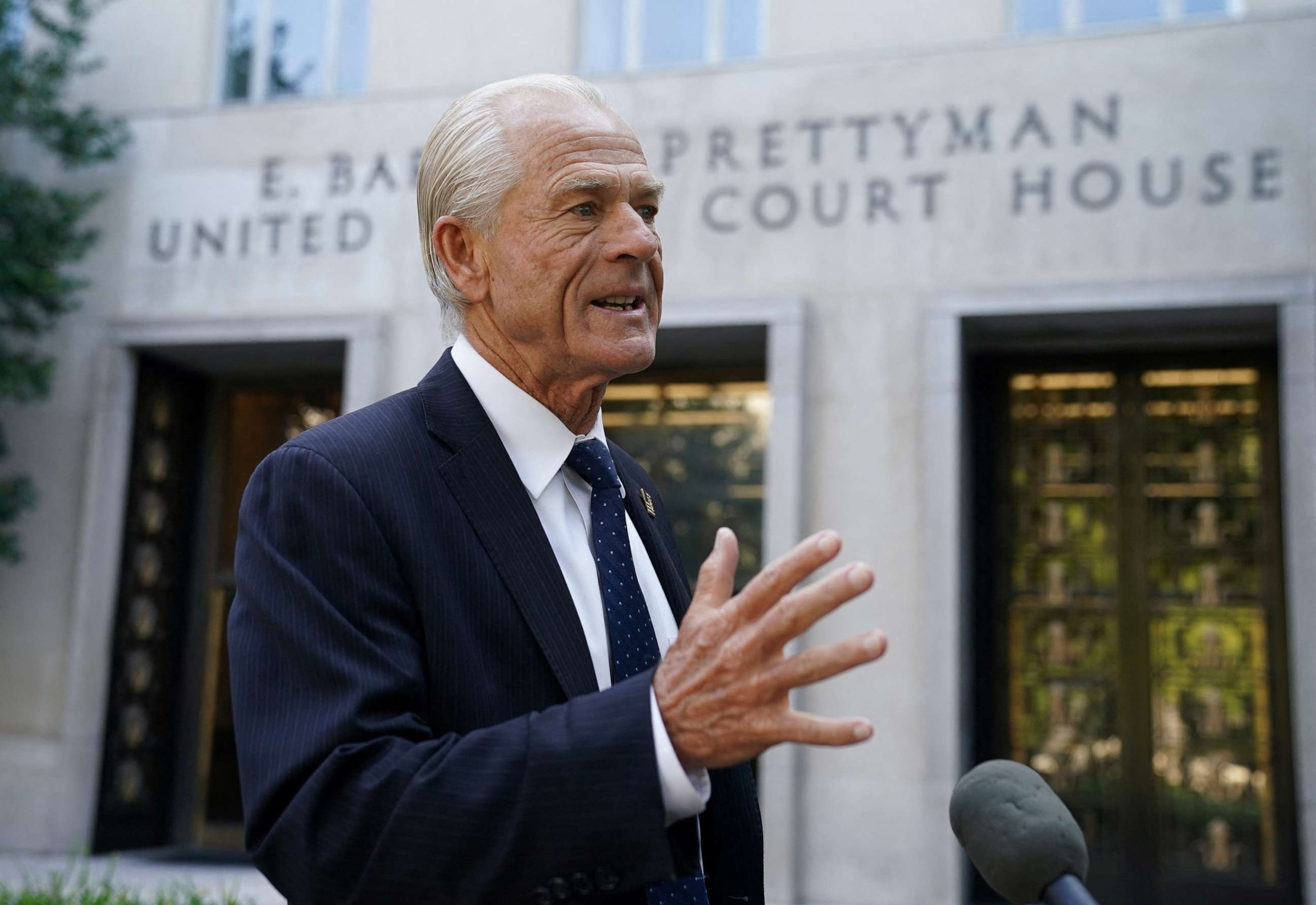 PHOTO: Peter Navarro stops to speak at the U.S. District Court in Washington, Sept. 6, 2023.