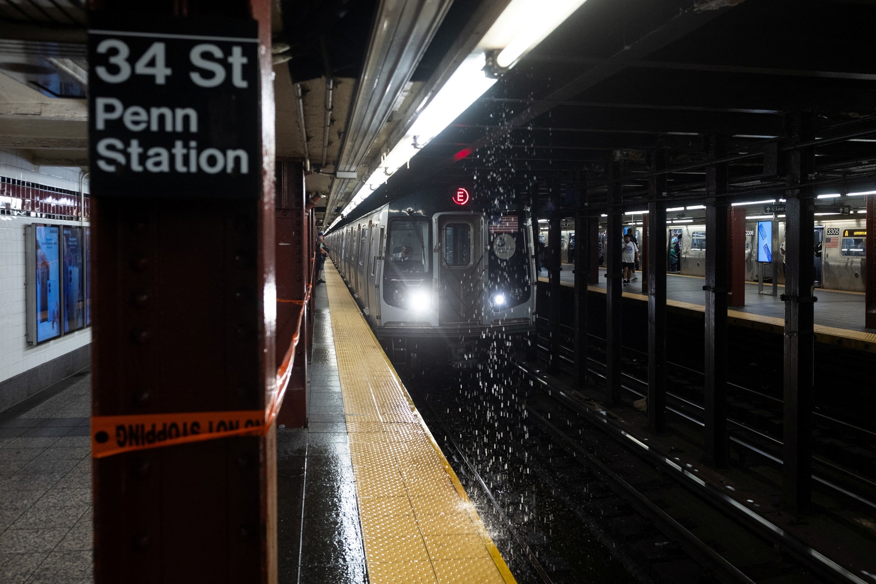 PHOTO: Rain leaks into a Subway station, in New York