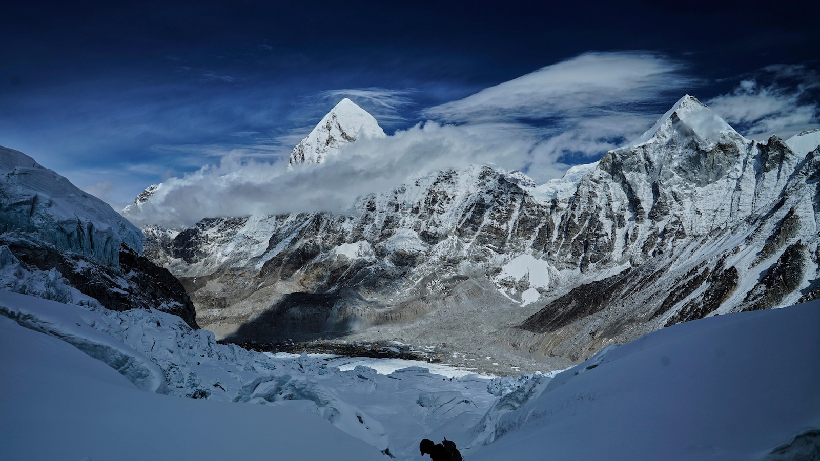 A massive, unstable ice block stalls Everest climbers at base camp