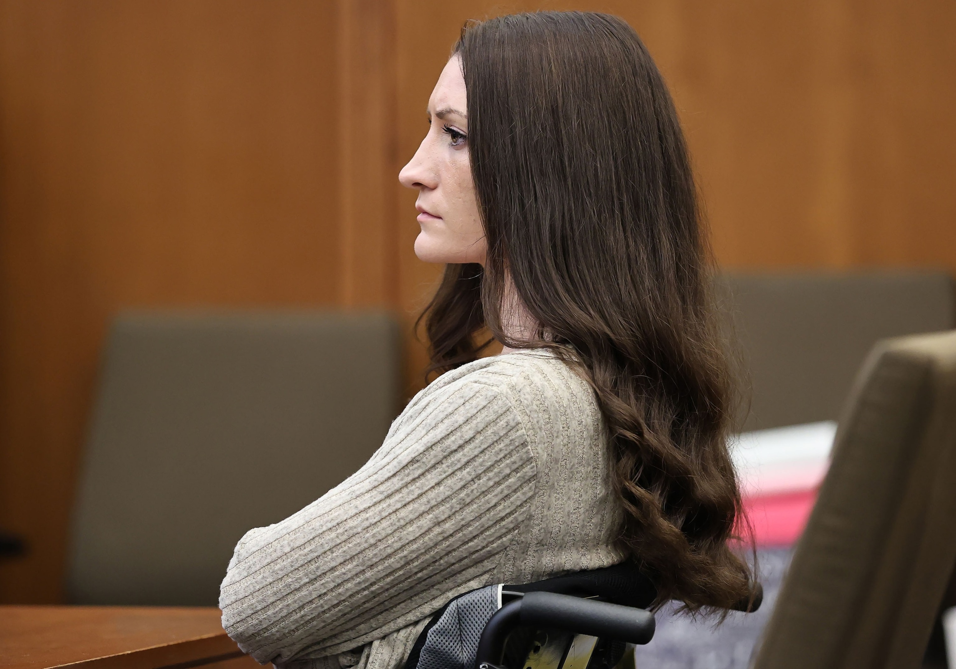 PHOTO: Lyndsay Clancy listens to the testimony of Dr. Gregory Saathoff  during her murder trial in Plymouth Superior Court, Aug. 26, 2026 in Plymouth, Mass. 