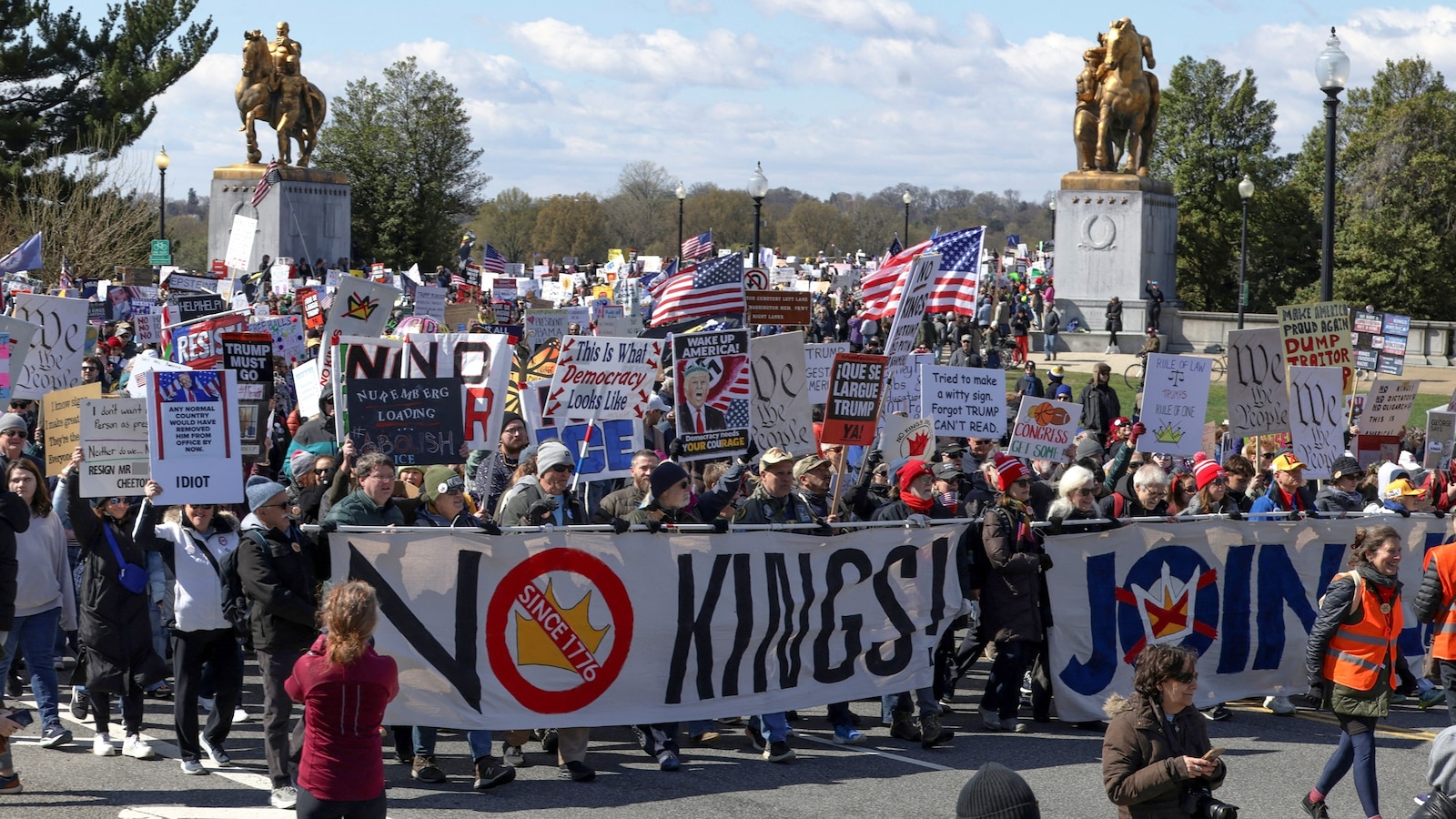“No Kings” protesters gather in cities and towns across the country