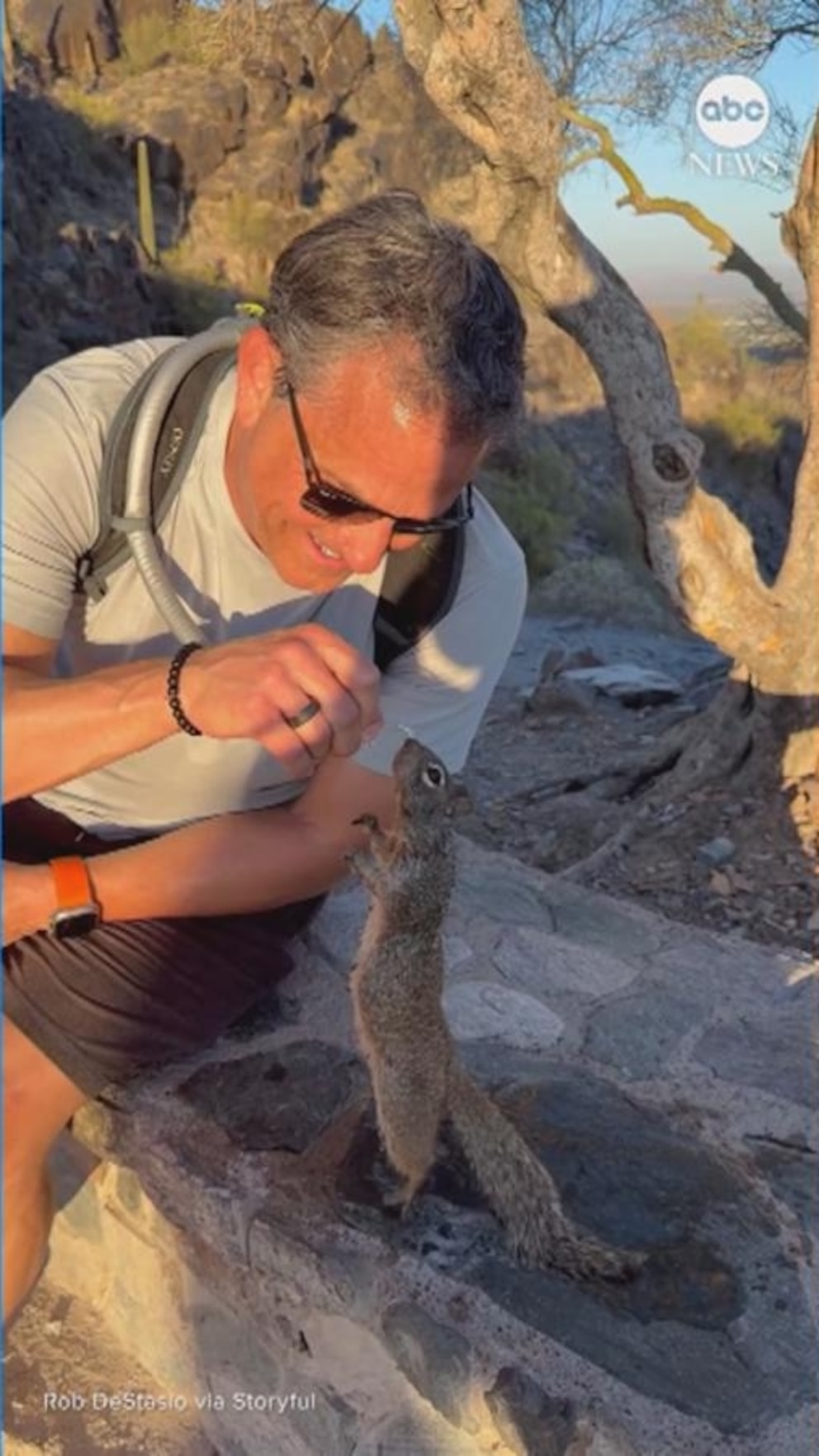 Video Man shares water with thirsty squirrel