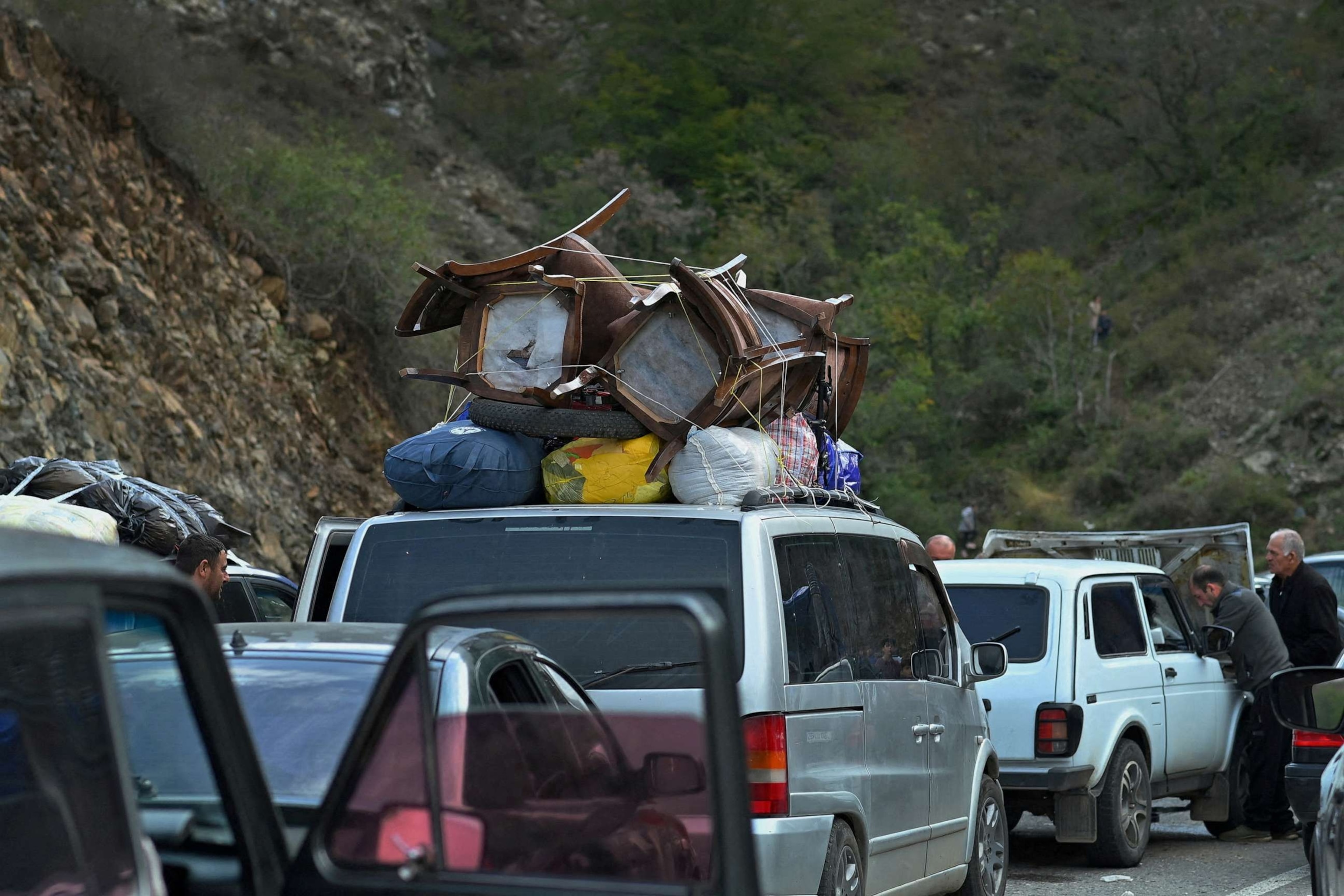 PHOTO:Vehicles carrying refugees from Nagorno-Karabakh, a region inhabited by ethnic Armenians, queue on the road leading towards the Armenian border, in Nagorno-Karabakh, Sept. 26, 2023.