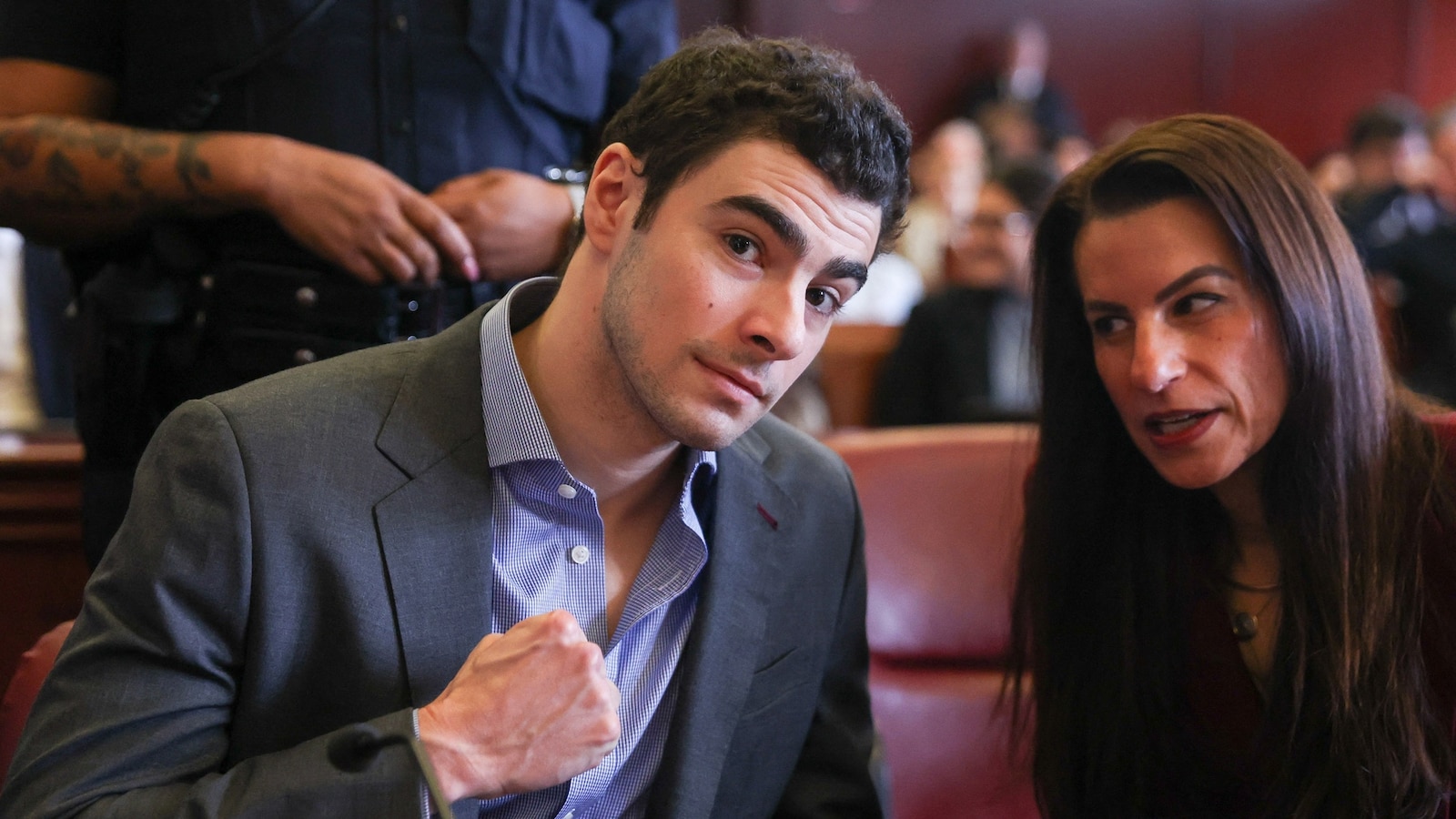 Luigi Mangione poses for cameras as he return to court for pretrial ...