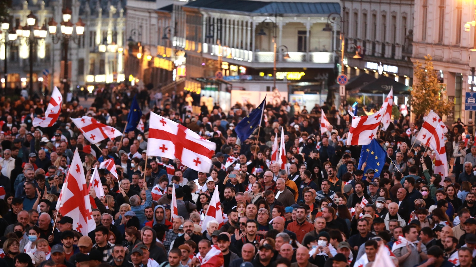 Tens of thousands march against Georgia's government as local election snubbed by opposition held
