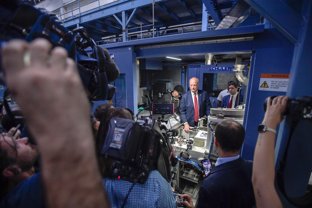 PHOTO: Treasurer of the United States Brandon Beach stamps the last penny at the US Mint on Nov. 12, 2025, in Philadelphia.
