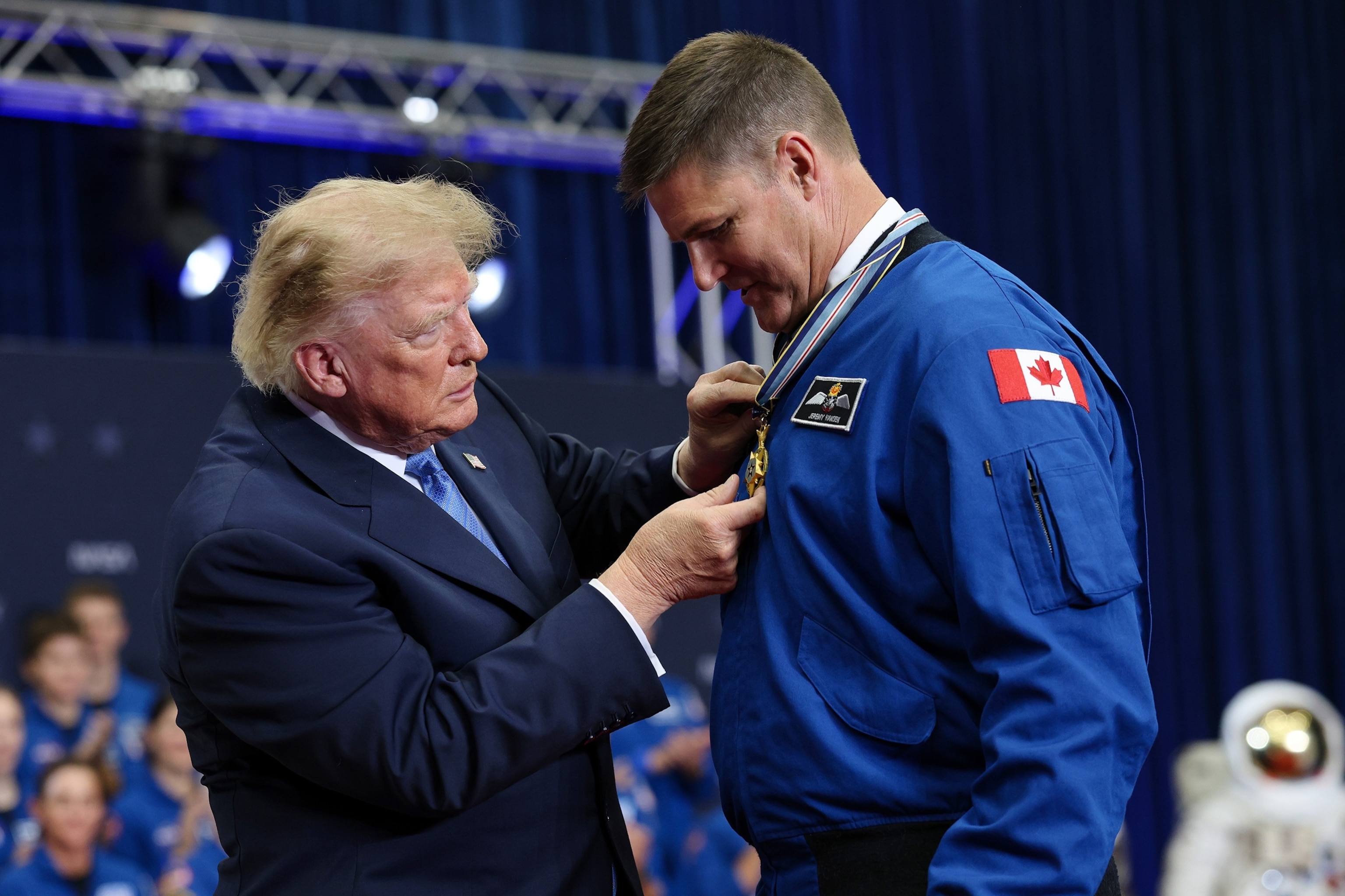 PHOTO: President Donald Trump awards the Congressional Space Medal of Honor to Jeremy Hansen of the Canadian Space Agency during a ceremony honoring Artemis II crew members at NASA's Johnson Space Center, August 28, 2026 in Houston, Texas. 