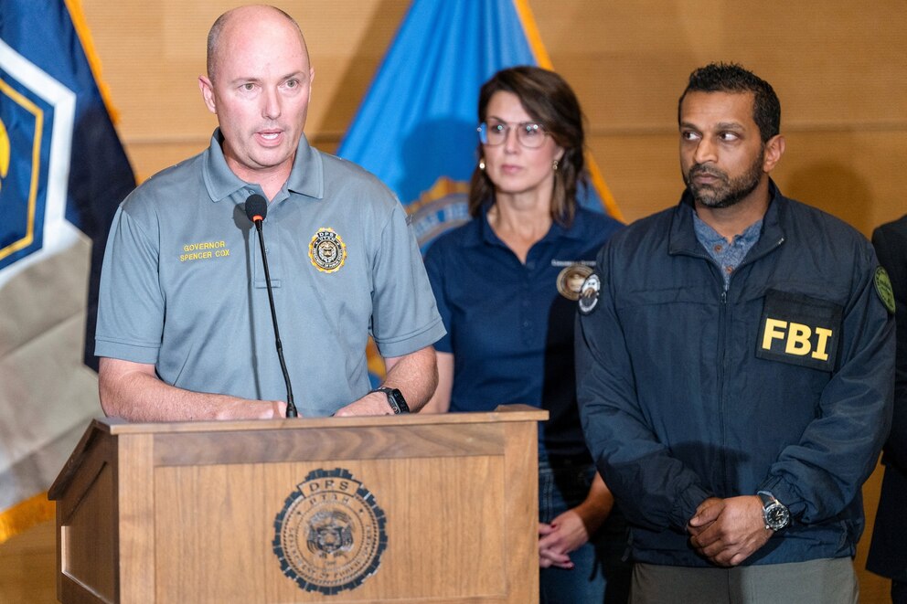 PHOTO: Utah Governor Spencer Cox speaks at a press conference, near FBI Director Kash Patel, at the Utah Valley University, in Orem, Utah, Sept. 11, 2025. 