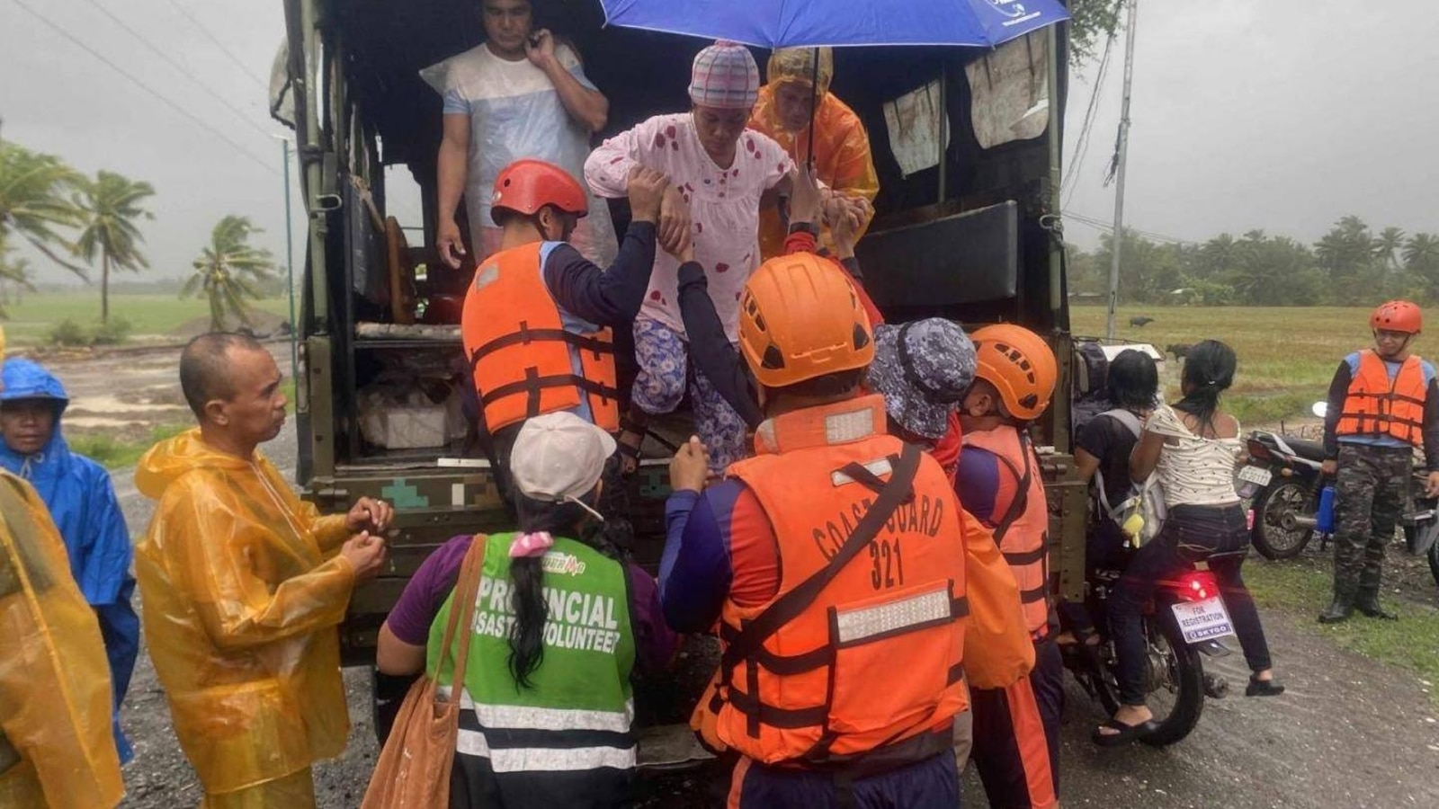 Typhoon Fung-wong blows away from the Philippines, leaving 2 dead and 1.4 million displaced