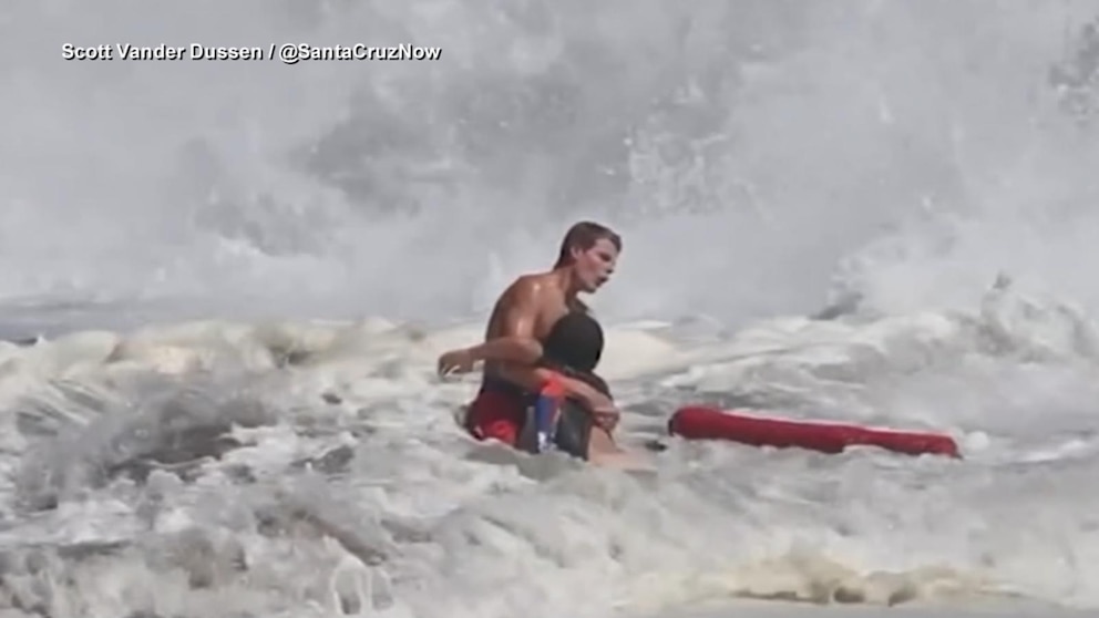 WATCH: Lifeguard fights to rescue boy caught in high surf