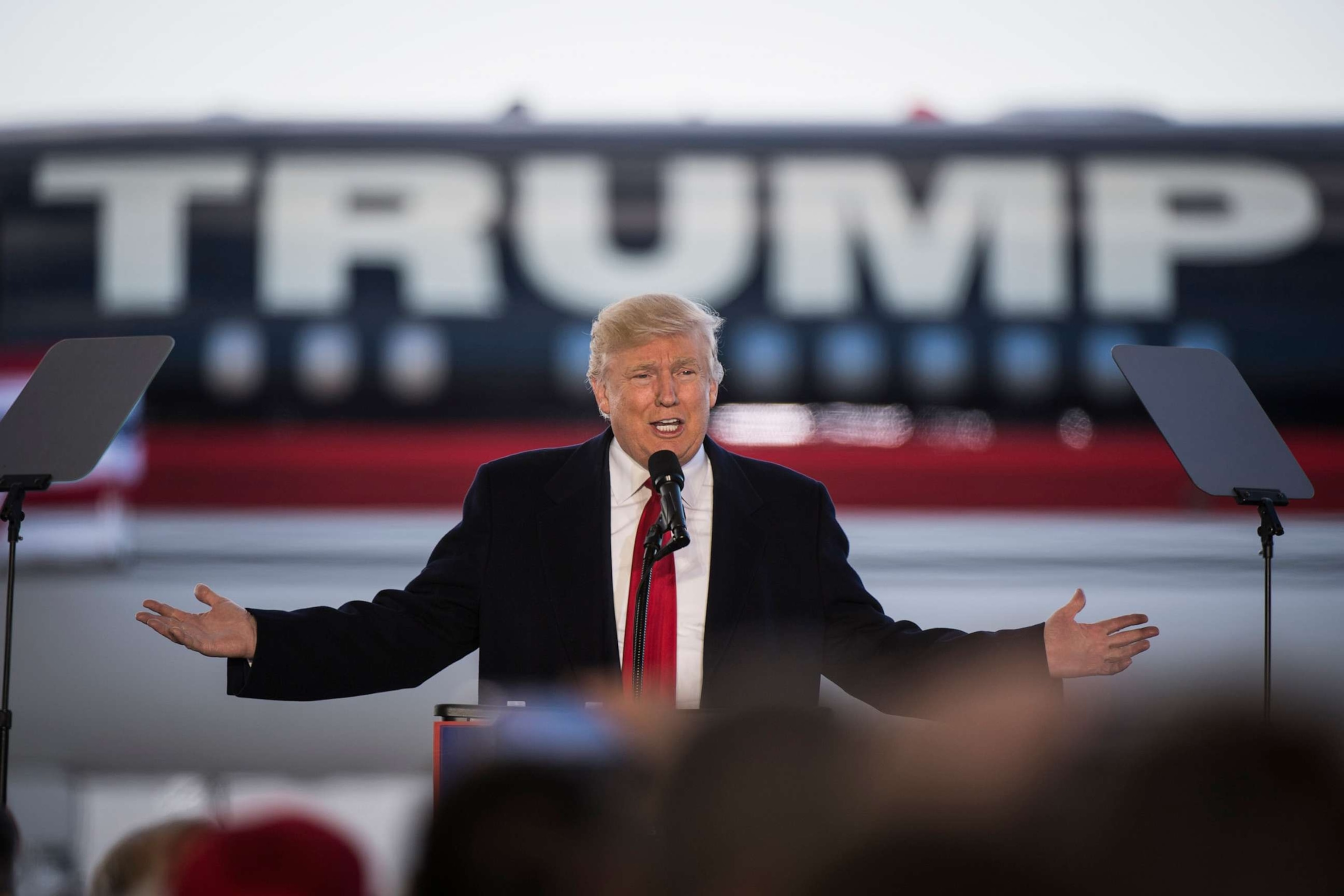 PHOTO: Republican presidential candidate Donald Trump speaks in front of his plane during a campaign event at an Air Transport Services Group Inc. airplane hanger in Wilmington, Ohio, Nov. 4, 2016.