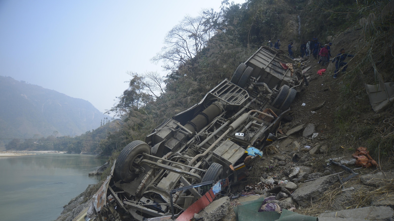 A packed bus plunges off a Nepal highway, killing 19 and injuring 25