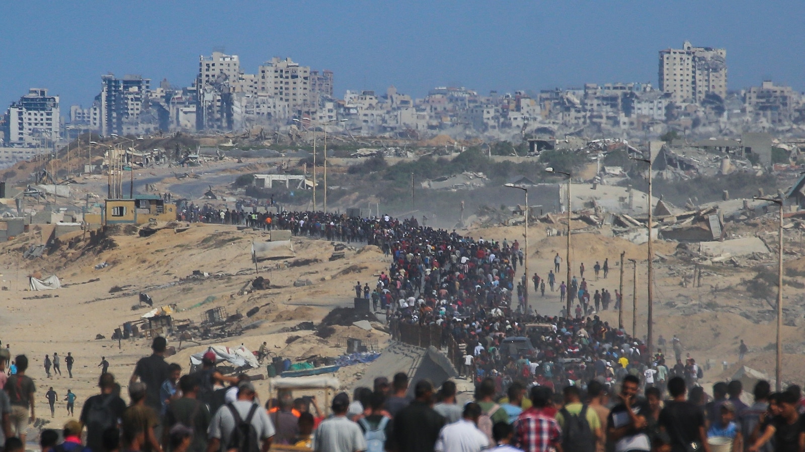 Israel-Gaza live updates: Ceasefire in effect as IDF repositions