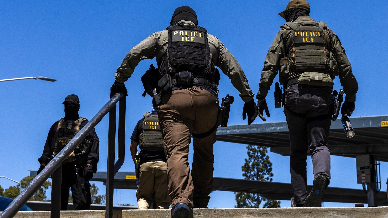 Virginia woman says ICE agent pointed gun at her, denies trying to run over agents