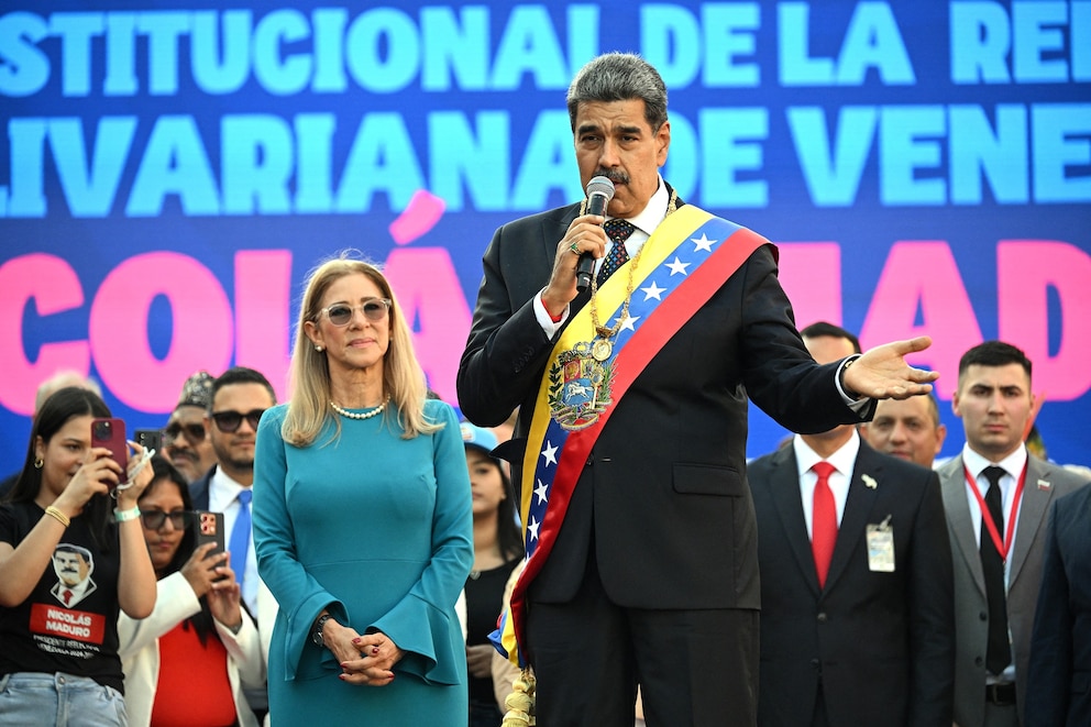PHOTO: In this Jan. 10, 2025, file photo,, Venezuela's President Nicolas Maduro delivers a speech next to his wife Cilia Flores in front of Miraflores presidential palace in Caracas.