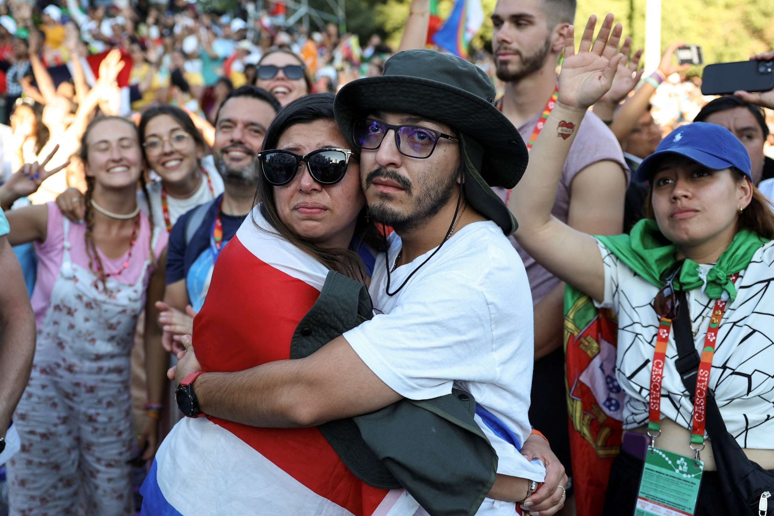 PHOTO: Pilgrims attend the Stations of the Cross with the presence of Pope Francis on Meeting Hill at Parque Eduardo VII in Lisbon, Portugal.