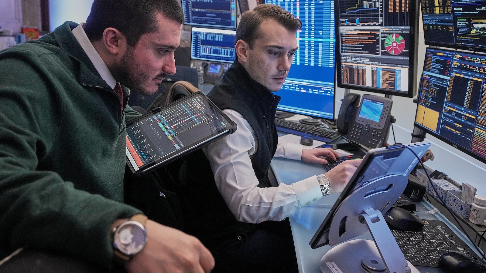 Wall Street opens higher while gold and silver claw back losses