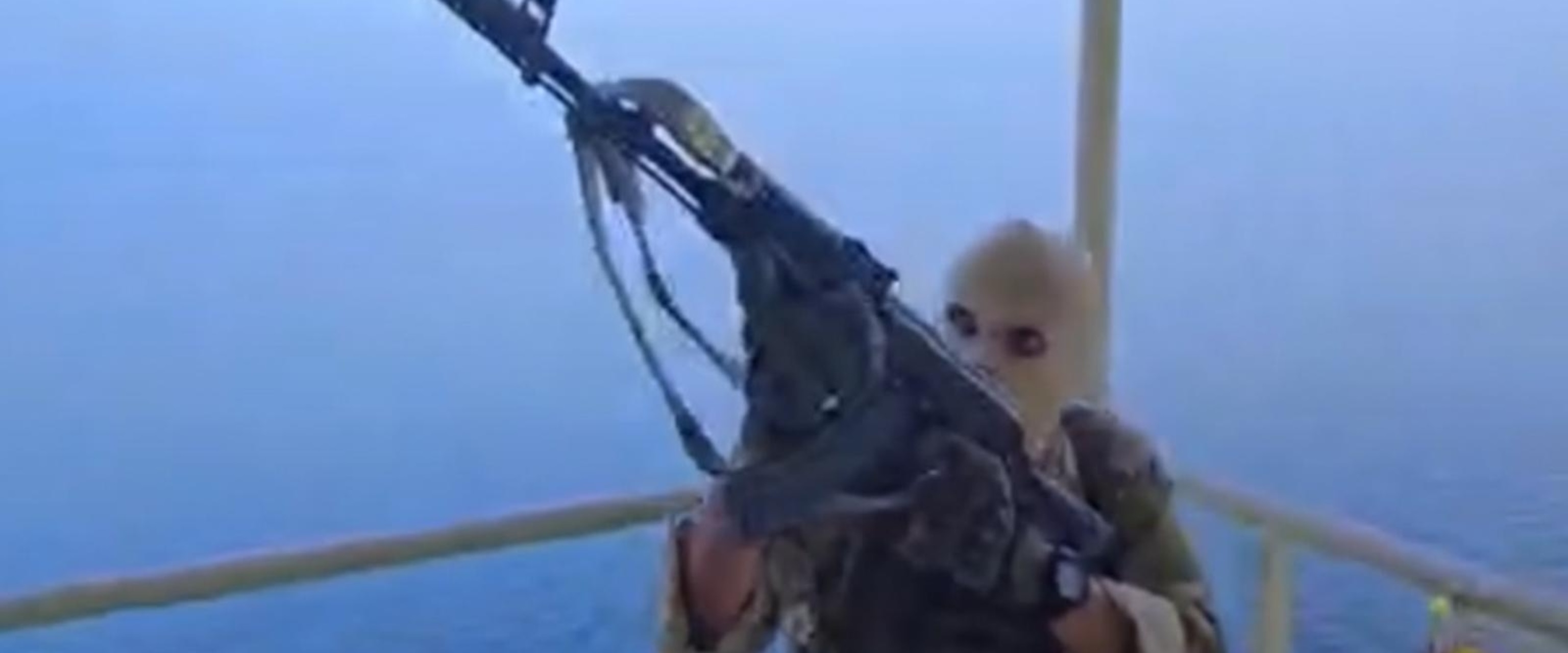 Video Iranian state TV airs video of masked gunmen boarding ship