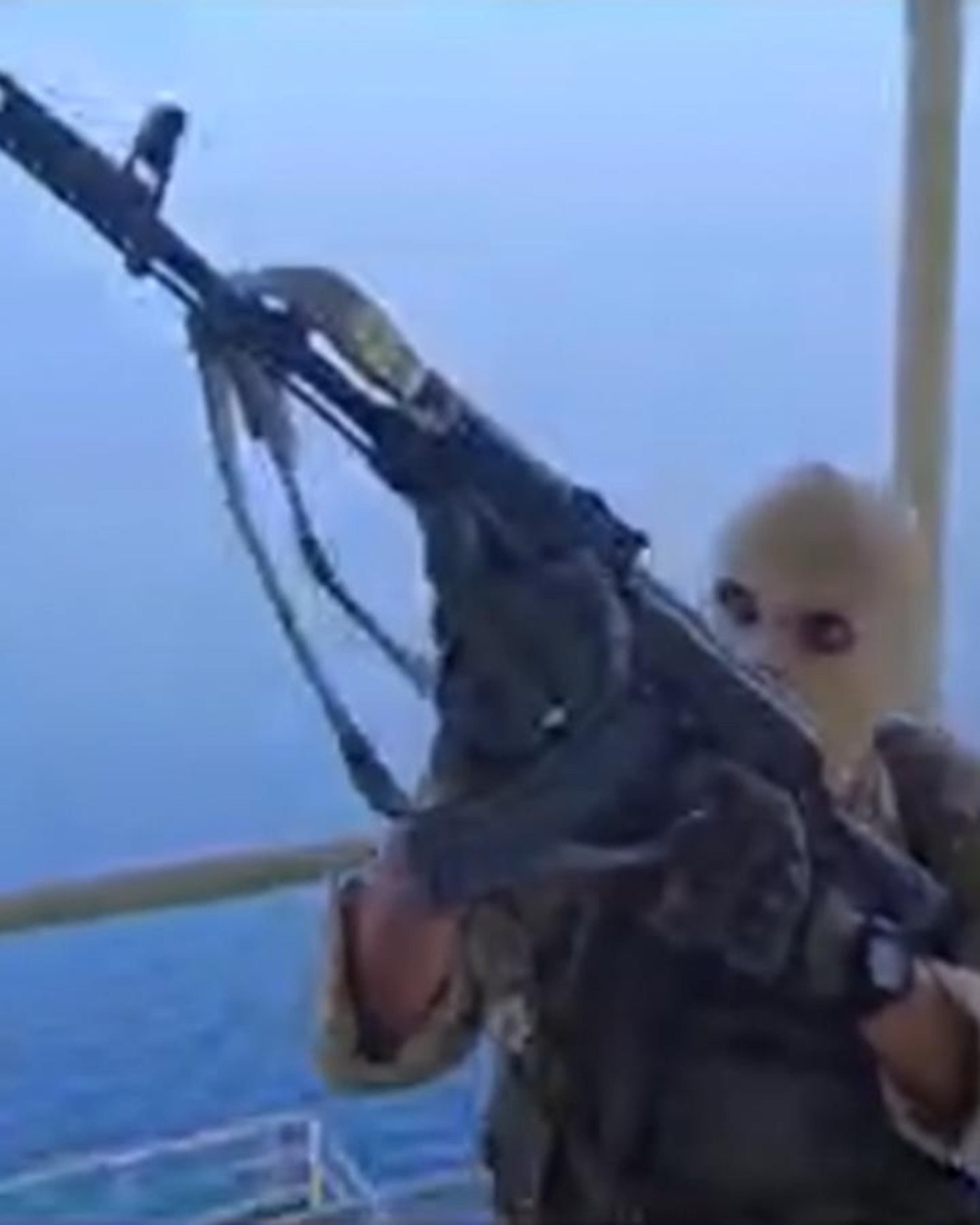 Video Iranian state TV airs video of masked gunmen boarding ship