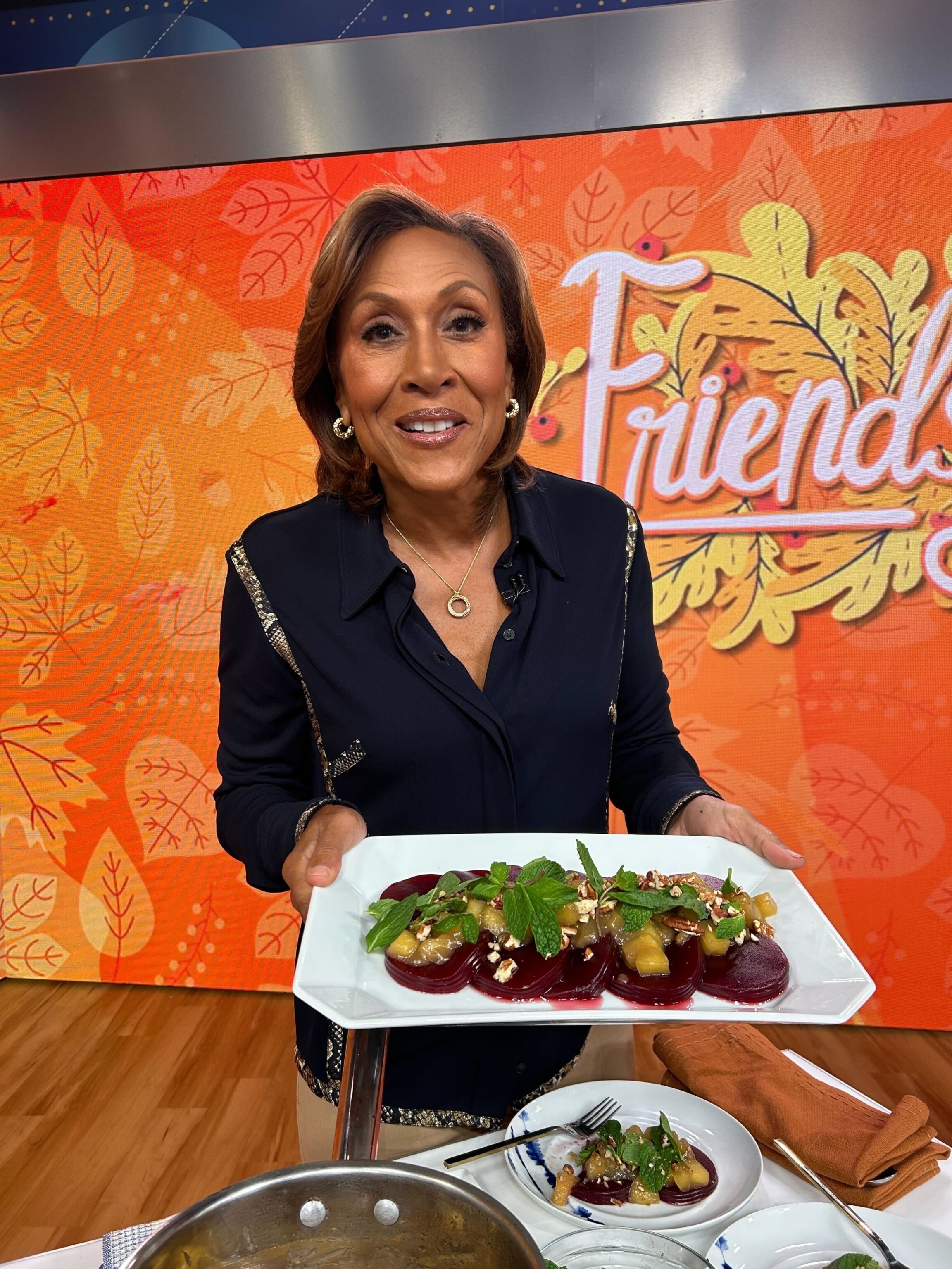 PHOTO: Robin Roberts with a plate of cranberries and apples made by chef Michael Chernow.