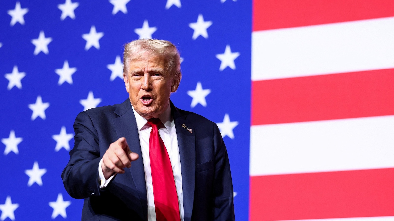 President Donald Trump gestures after speaking during a meeting of senior military leaders convened by Defense Secretary Pete Hegseth, at Marine Corps Base Quantico in Quantico, Va., Sept. 30, 2025. 