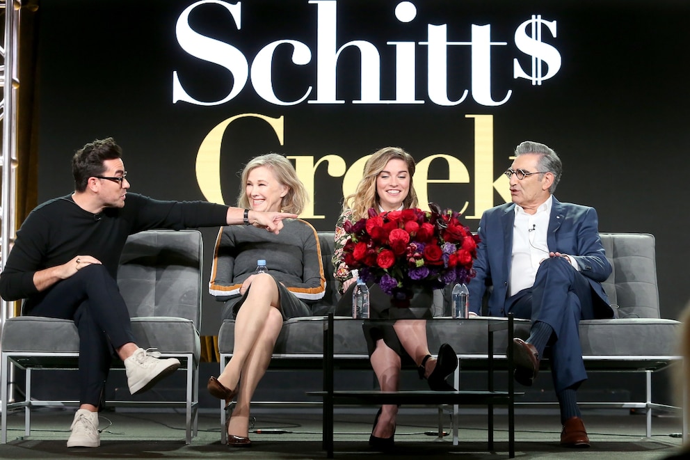PHOTO: Co-creator/Executive producer/Actor Daniel Levy, actors Catherine O'Hara and Annie Murphy, and co-creator/executive producer/actor Eugene Levy of 'Schitt's Creek' speak onstage during the 2018 Winter Television Critics Association Press Tour.