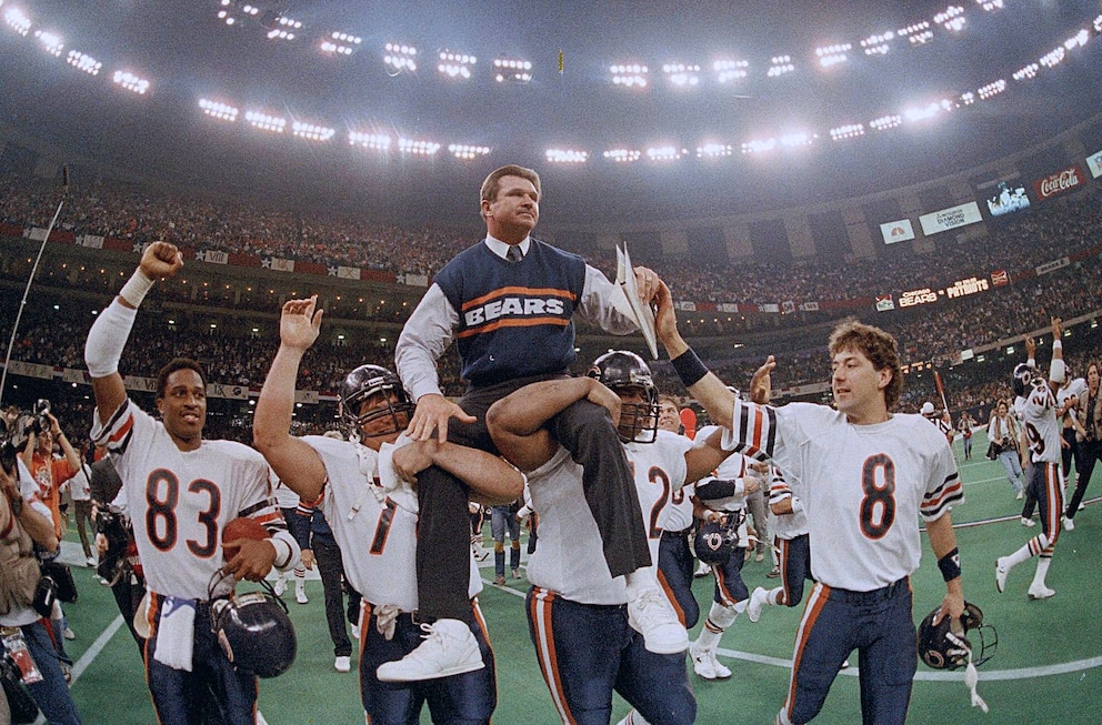 PHOTO: Chicago Bears coach Mike Ditka is carried off the field by Steve McMichael, left, and William Perry after the Bears defeated the New England Patriots in Super Bowl 20 in New Orleans on Jan. 26, 1986.