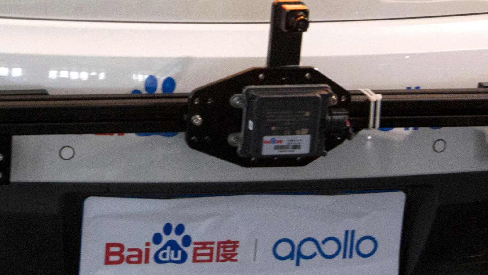 Passengers stranded in moving traffic after robotaxi outage in China's Wuhan