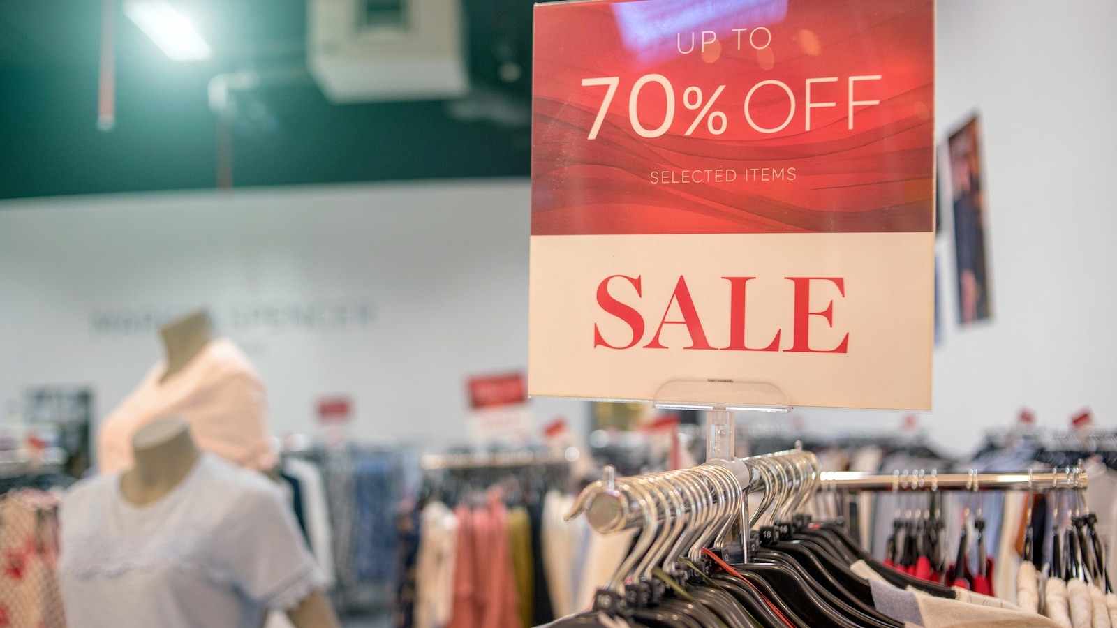 Stock photo of a sale sign in a department store.