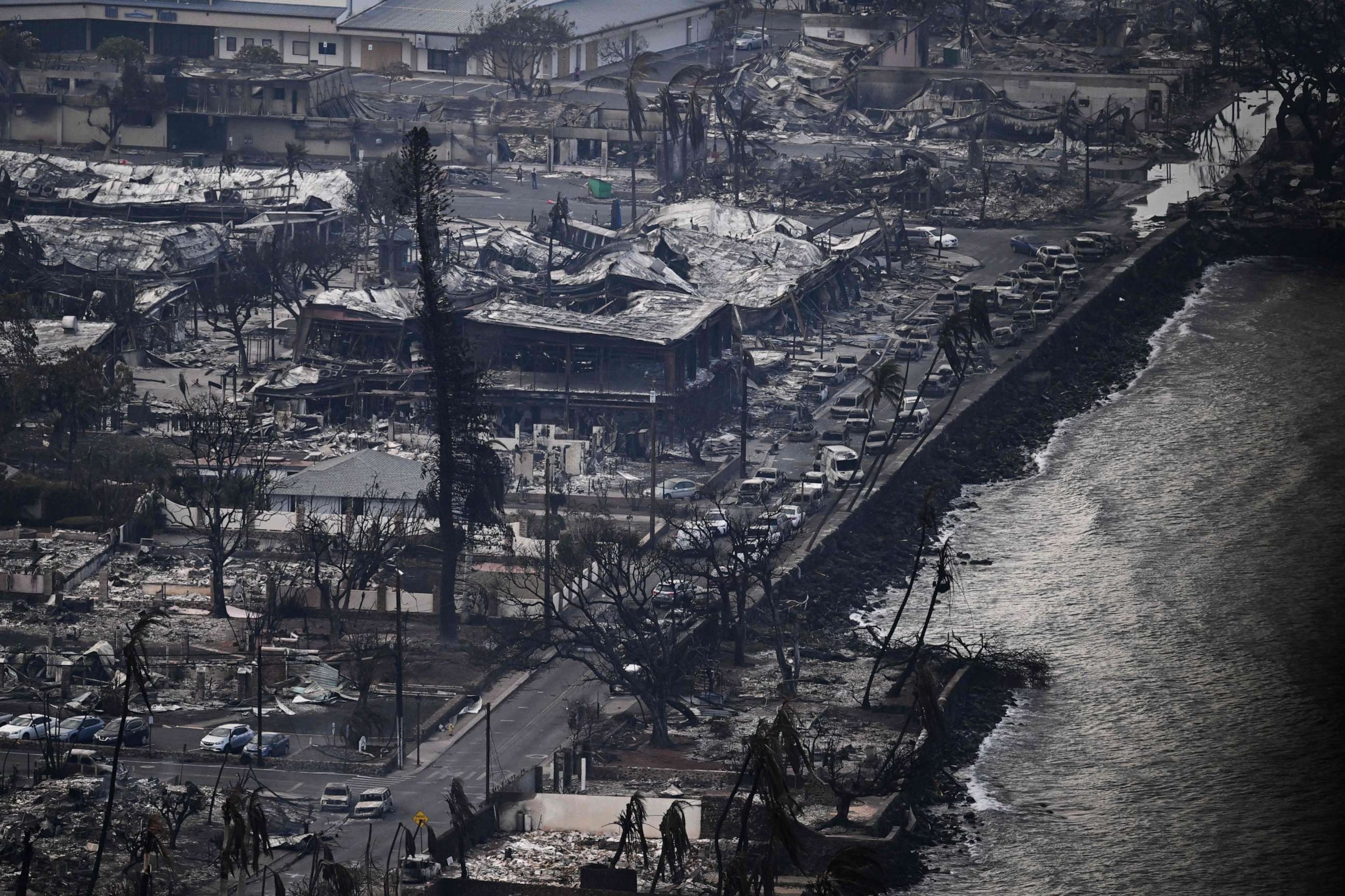 PHOTO: An aerial view shows destroyed homes and buildings that burned to the ground around the harbor and Front Street in the historic Lahaina Town in the aftermath of wildfires in western Maui in Lahaina, Hawaii, on Aug. 10, 2023.