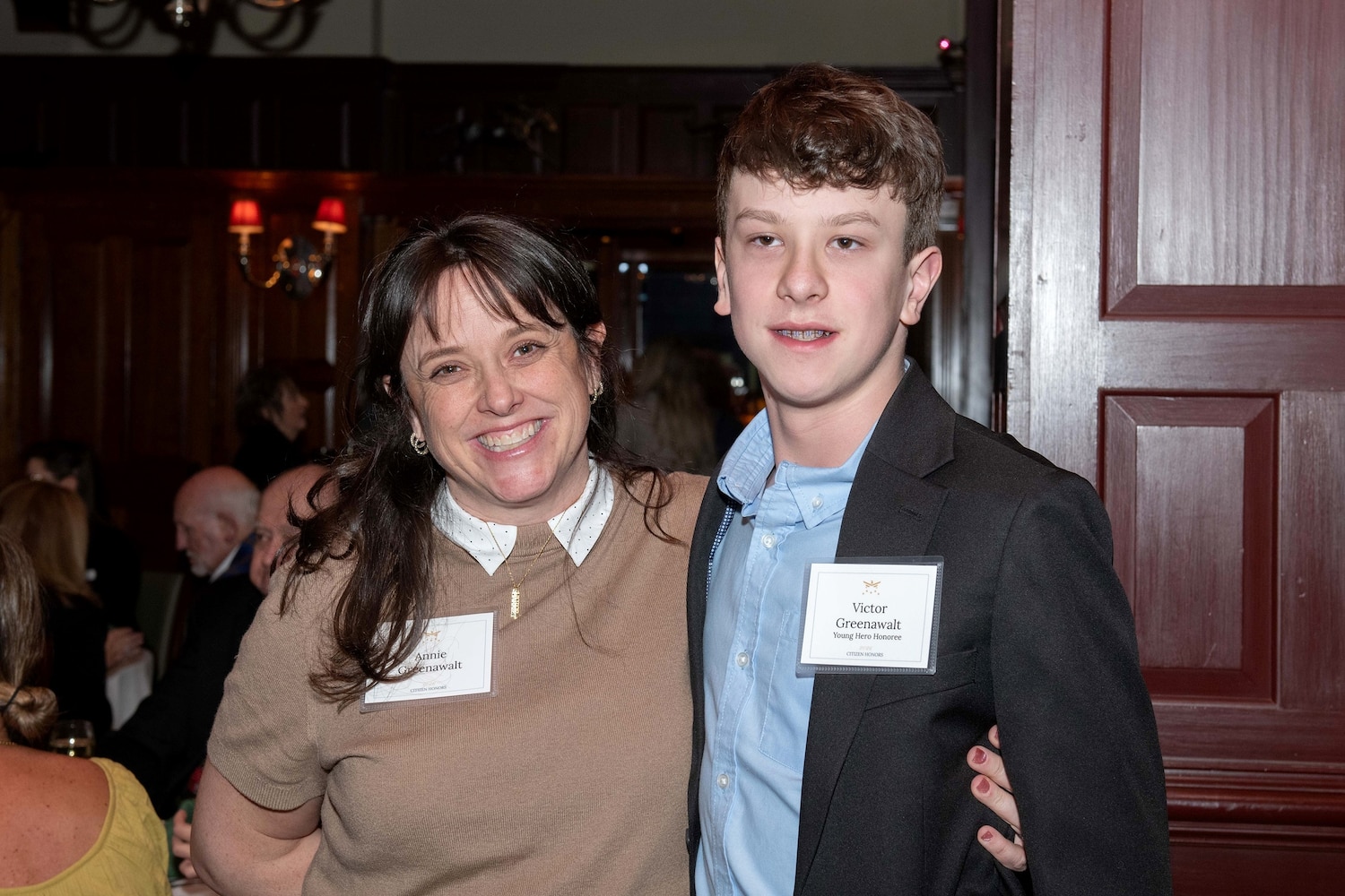 Boy receiving Citizen Honor Award for shielding classmate during school shooting in Minneapolis