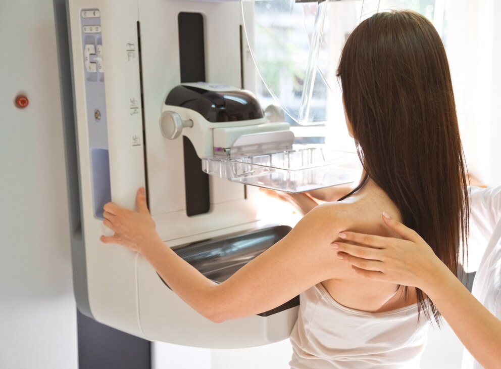 PHOTO: In this undated stock photo, a doctor performs a mammogram on a patient.