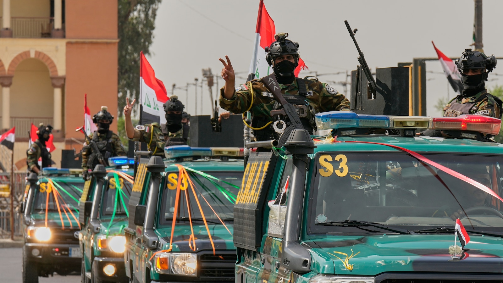As the last US troops exit Iraq, Kurdish fears rise and militias celebrate
