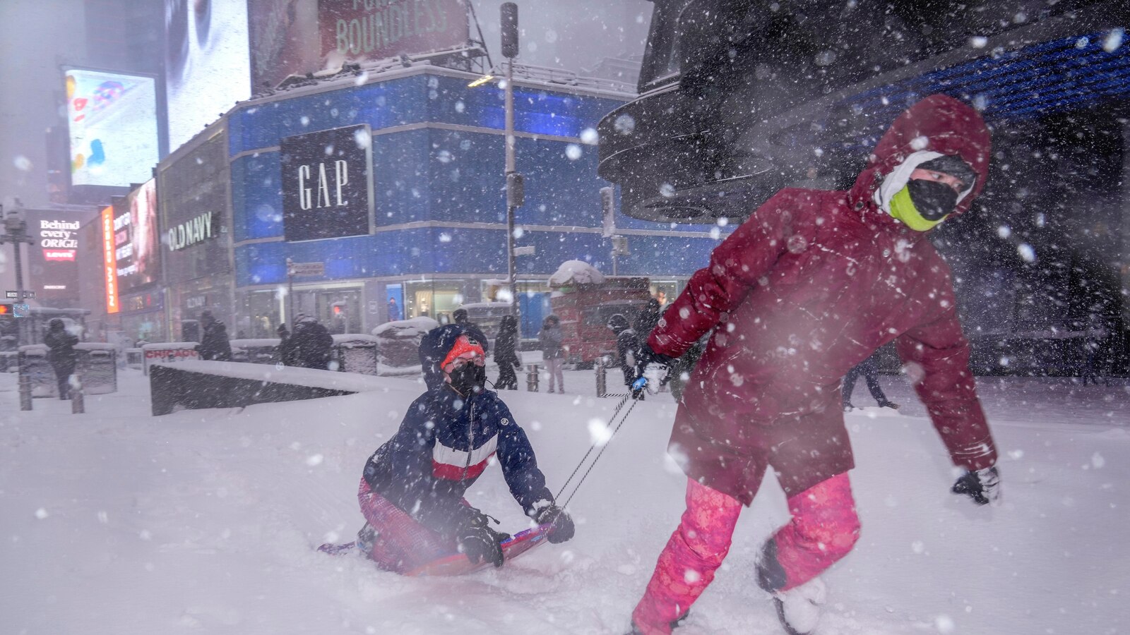 New York City hunkers down under blizzard warnings and a travel ban as winter storm hits Northeast