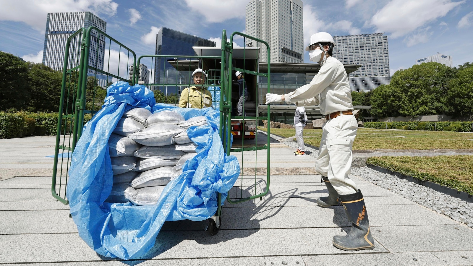 Slightly radioactive Fukushima soil is used at Japanese prime minister's office to prove safety