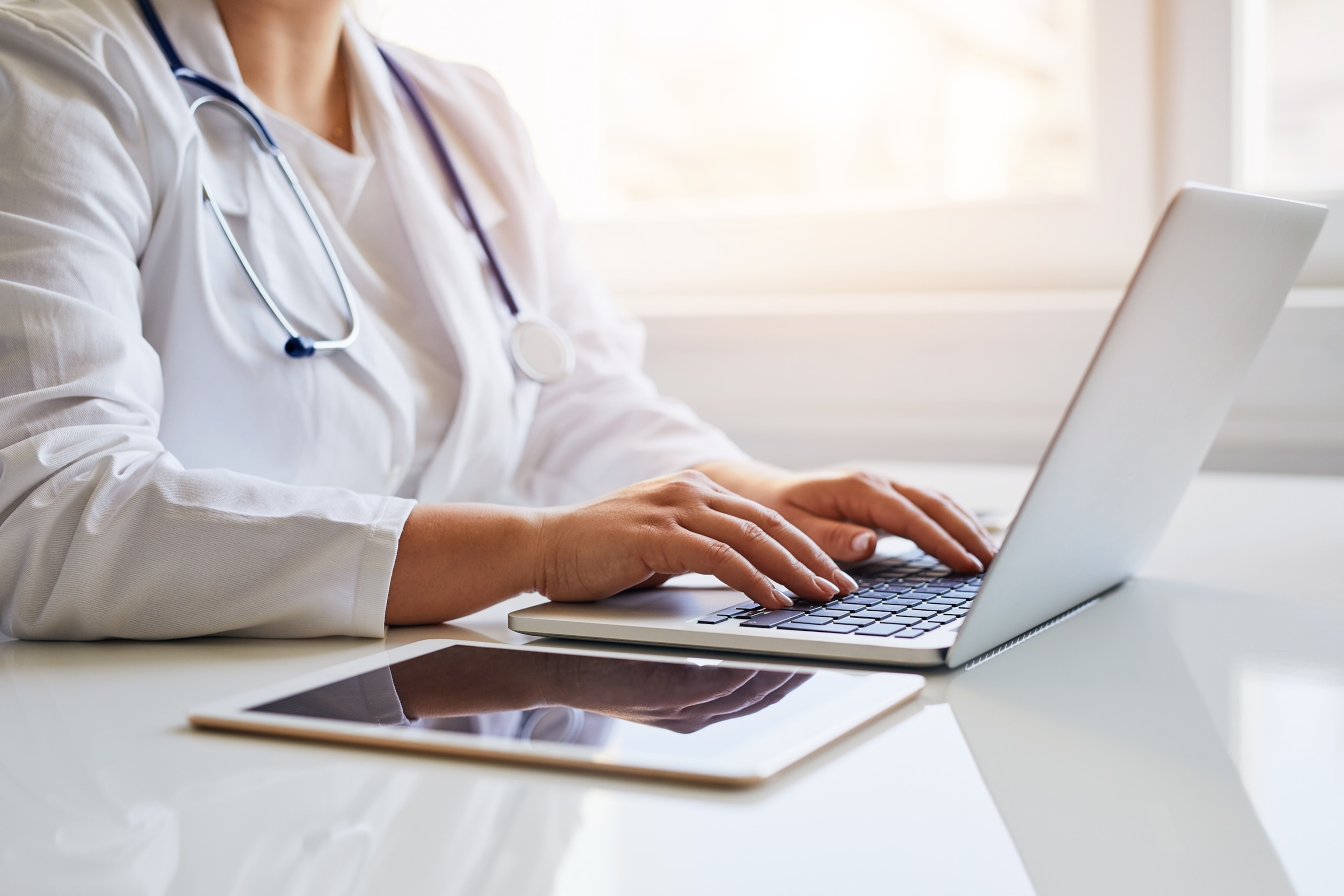 PHOTO: A doctor works on a computer in an undated stock photo.