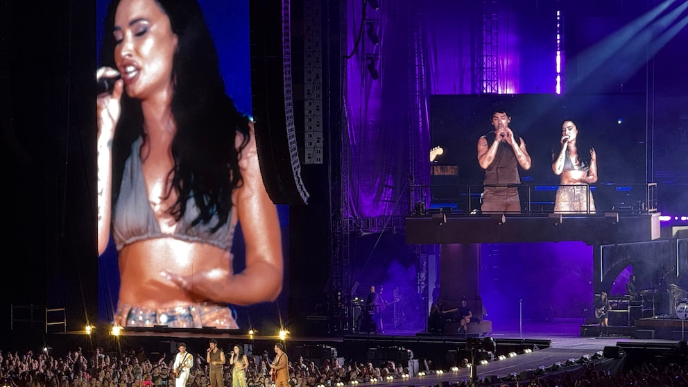 Jonas Brothers reunite with fellow 'Camp Rock' star Demi Lovato on tour