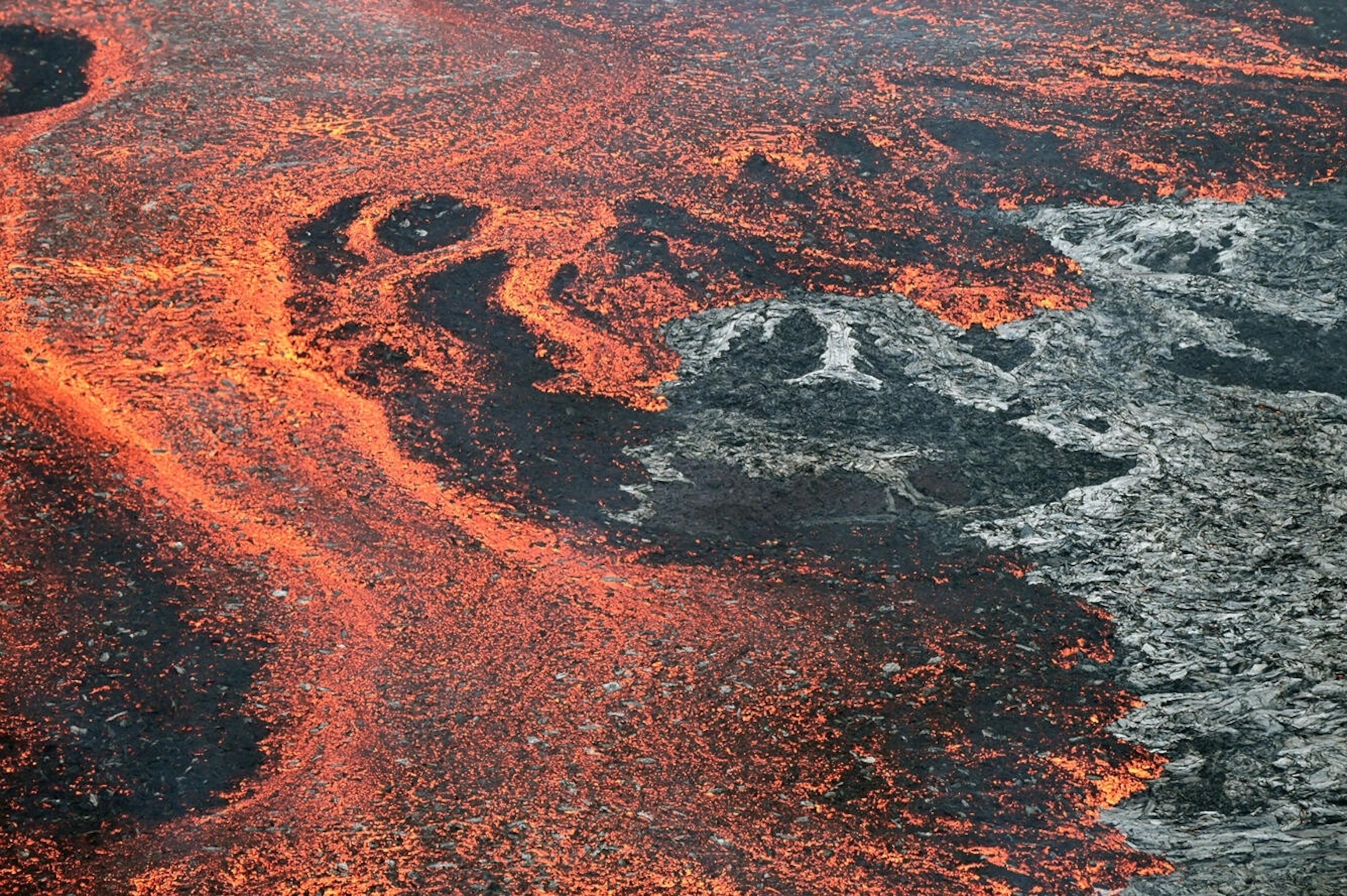 PHOTO: A close-up view of lava on the floor of Halemaʻumaʻu crater and the southwest side of Kaluapele, Kīlauea's summit caldera, during episode 47 on May 14, 2026. 