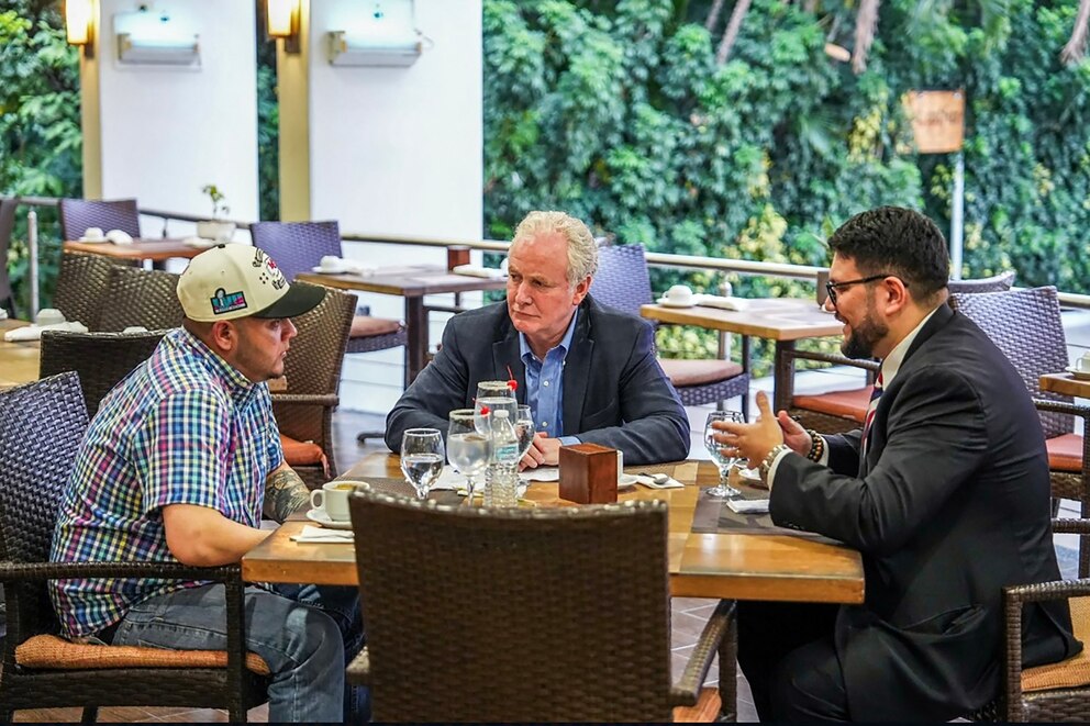 PHOTO: US Senator Chris Van Hollen holds a meeting with Salvadoran migrant Kilmar Abrego Garcia (L), a US citizen wrongfully deported to his home country, at a hotel in San Salvador on April 17, 2025.