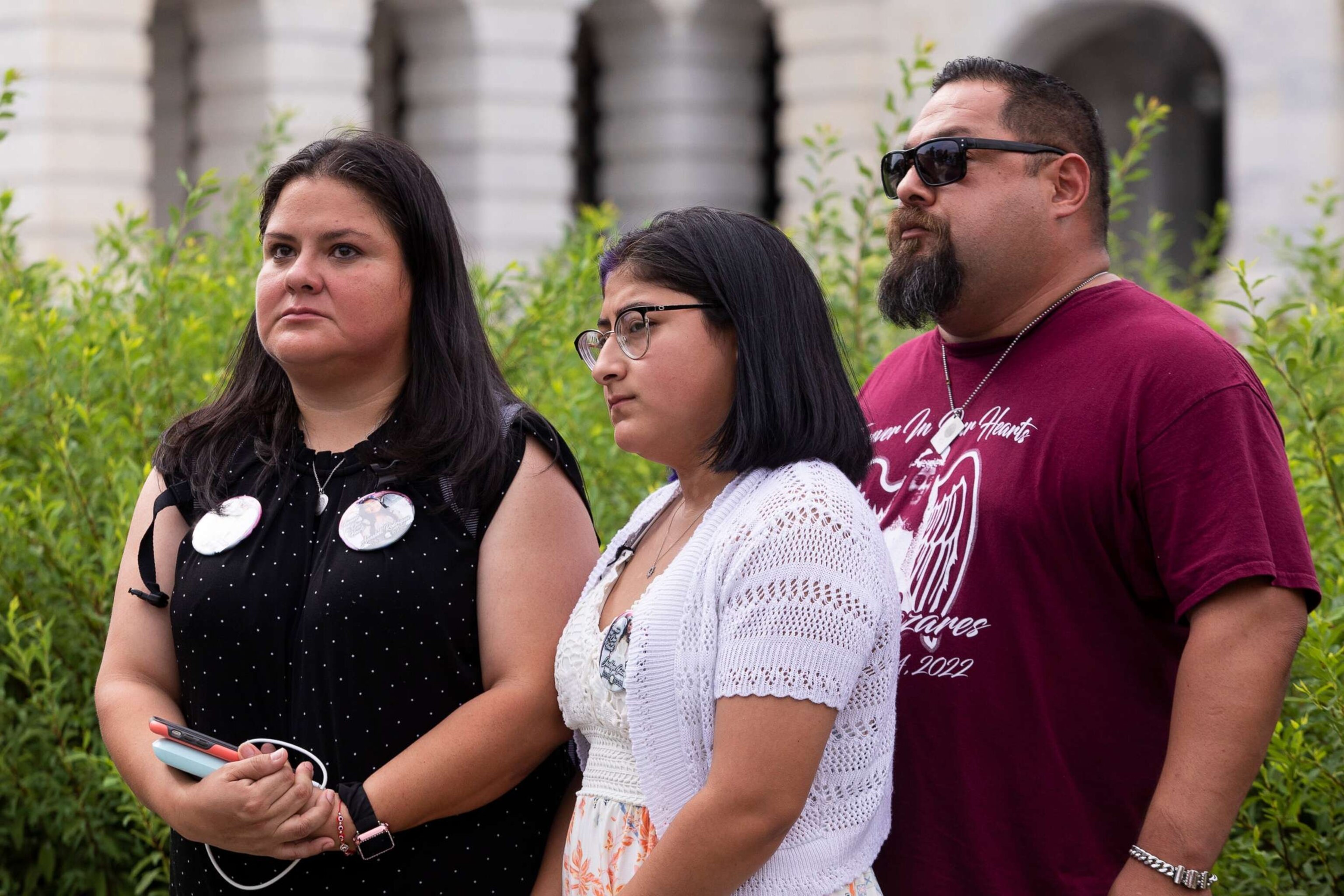 PHOTO: Gloria Cazares, whose daughter Jacklyn Cazares was a victim of the school shooting in Uvalde, Texas, stand with daughter Jazmin Cazares and husband Jacinto Cazares during a press conference on July 27, 2022 in Washington, D.C. 