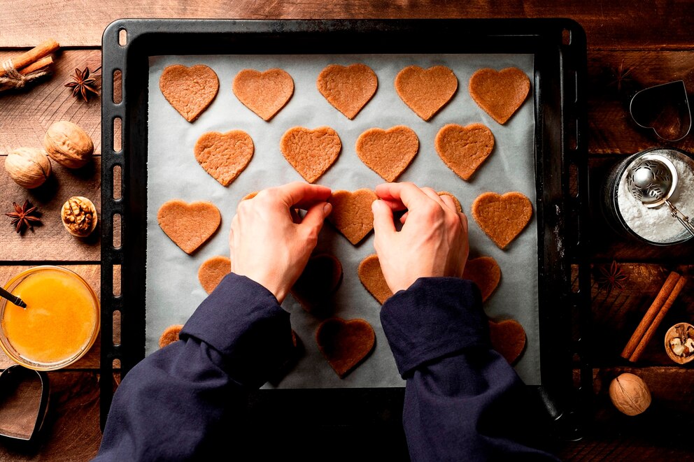 PHOTO: Stock photo of a person making heart-shaped cookies.