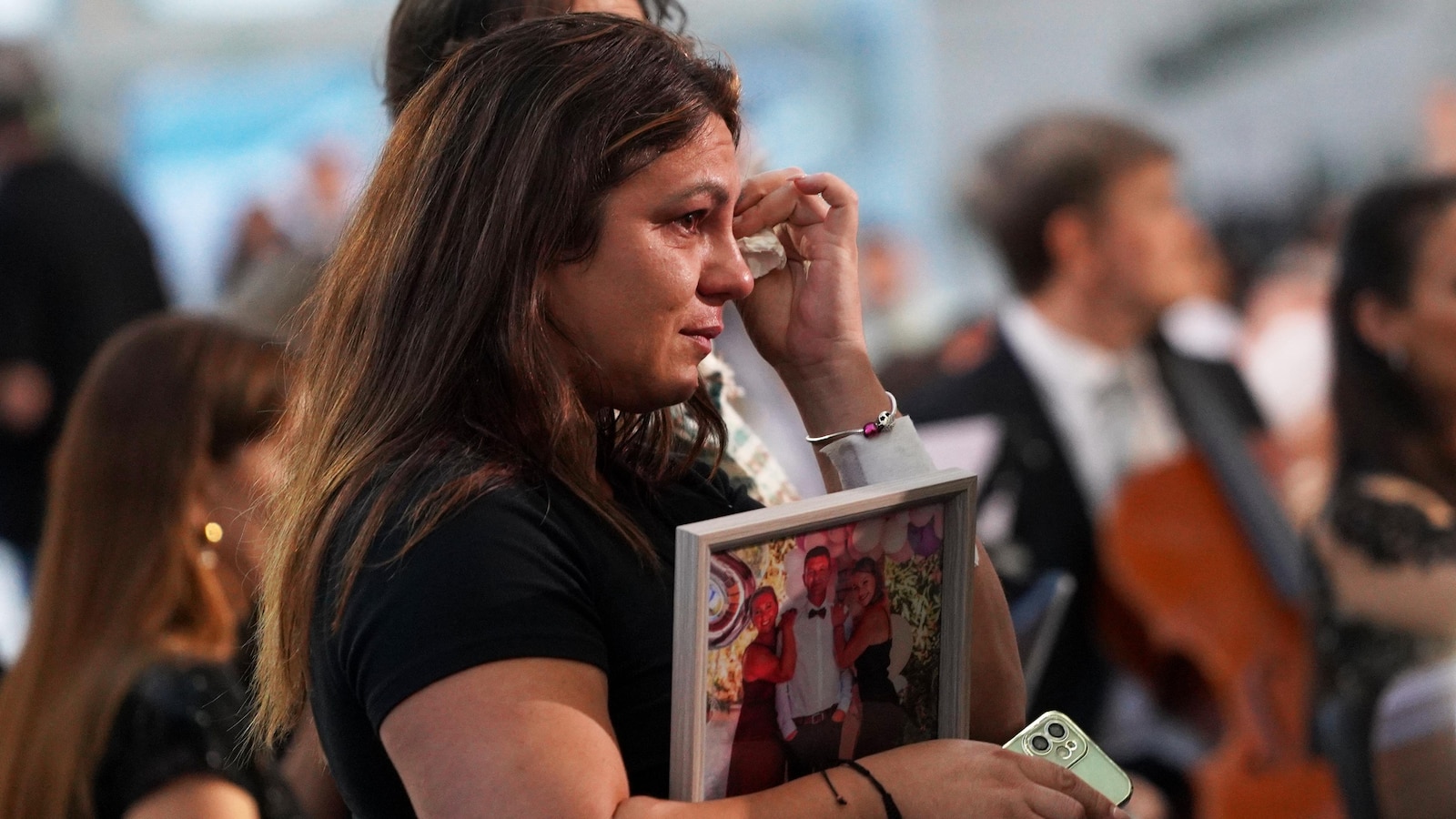 Families of Spain's flood victims voice sorrow and rage at one-year memorial ceremony