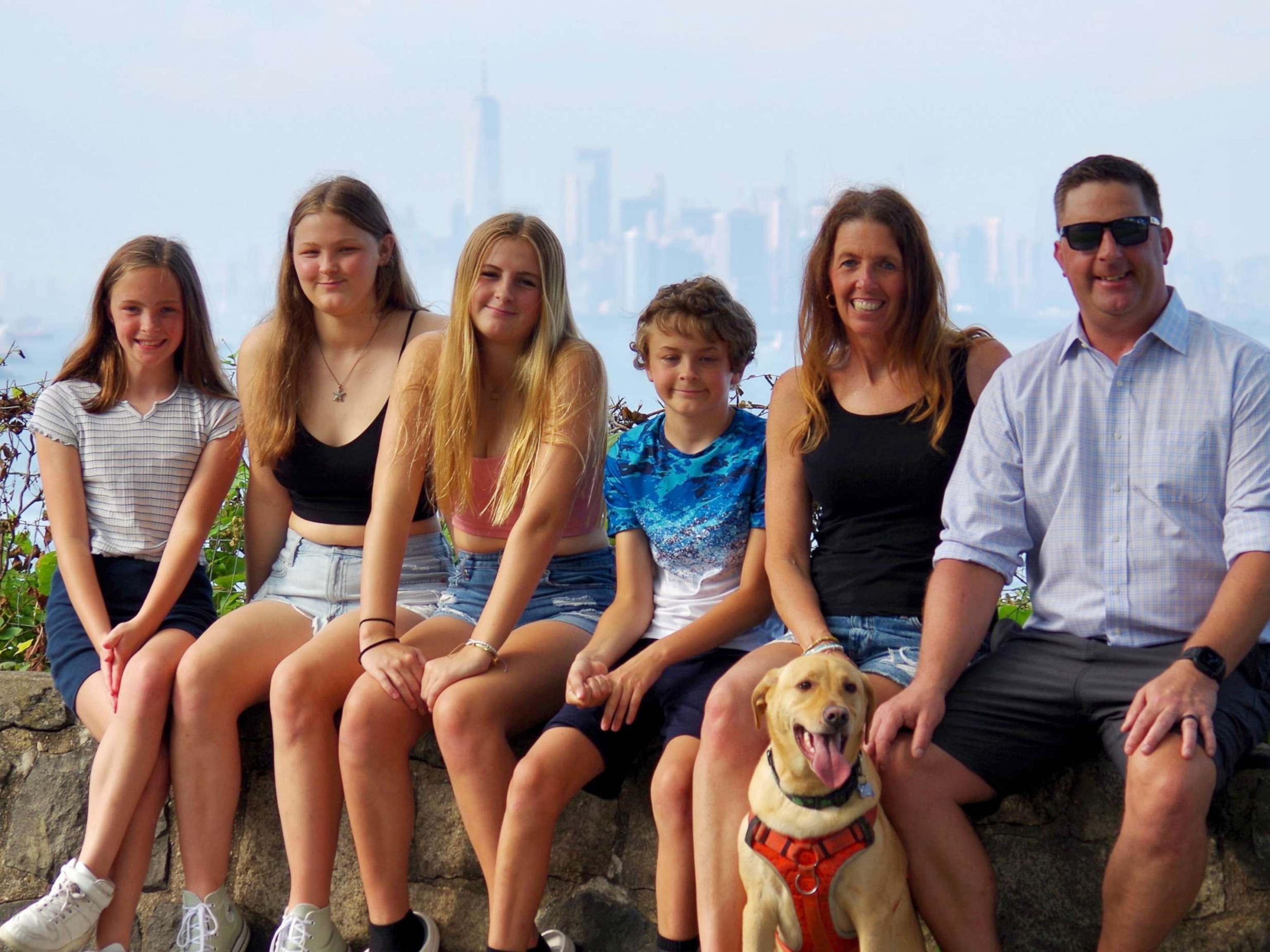 PHOTO: Andie and Joe Coakley, who have served on the Coast Guard, are pictured with their four children. Andie says military families have to worry about when the next paycheck is coming with a government shutdown.