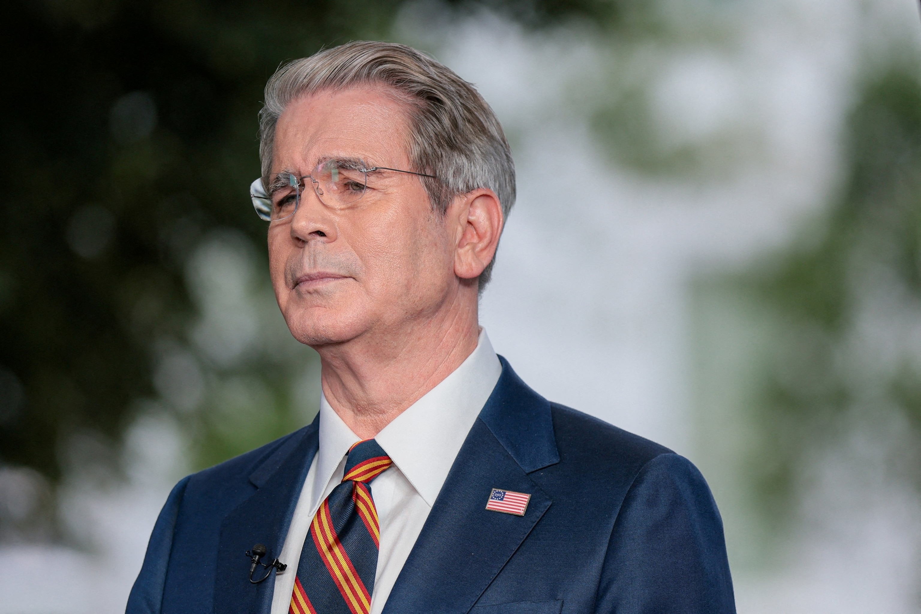 PHOTO: FILE PHOTO: U.S. Treasury Secretary Scott Bessent attends a media interview at the White House