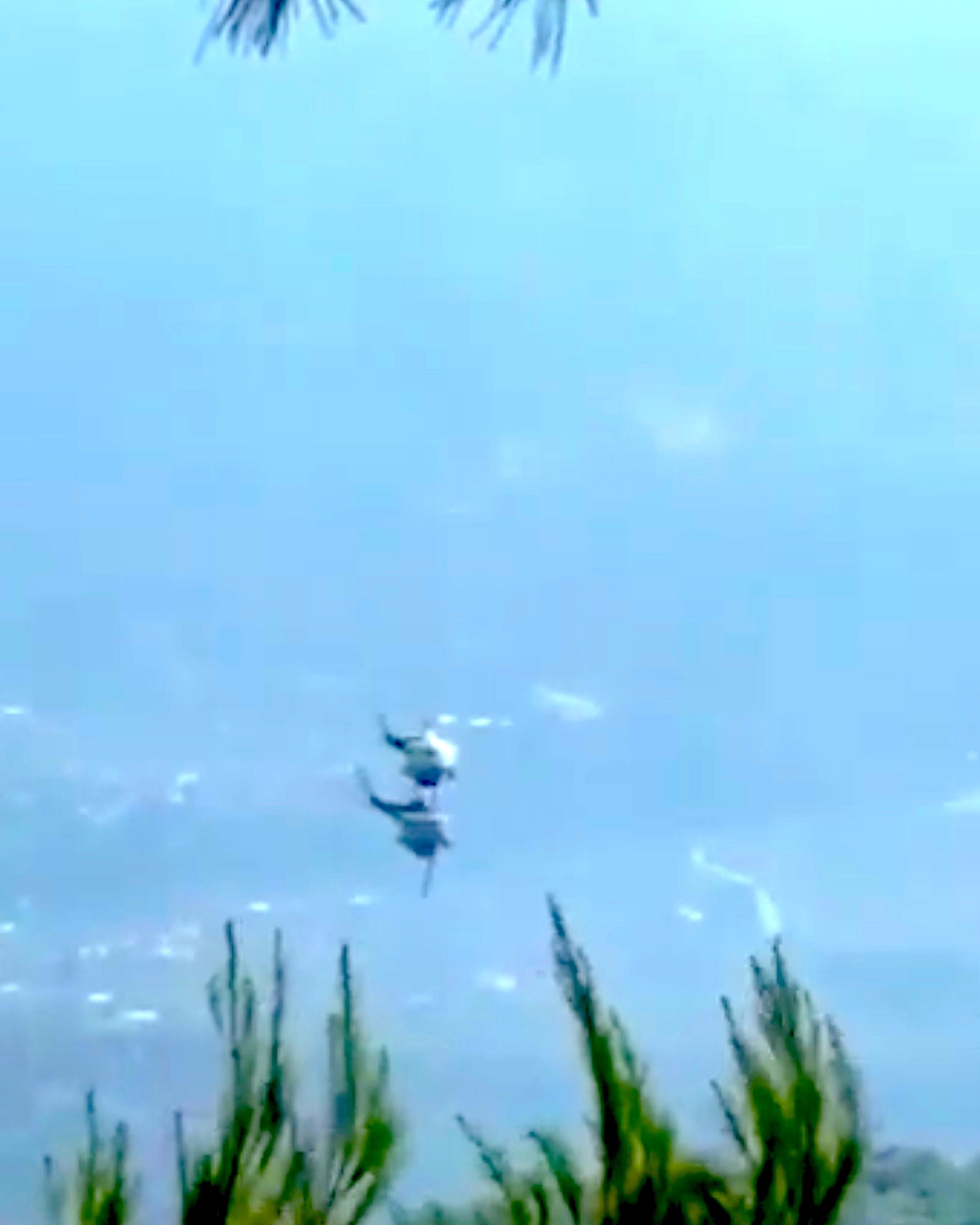PHOTO: A bystander video showed two firefighting helicopters flying perilously close to each other before colliding in midair, Aug. 2, 2026, while battling a wildfire in Psatha in the Boeotia region of Greece, about 45 miles northwest of Athens.