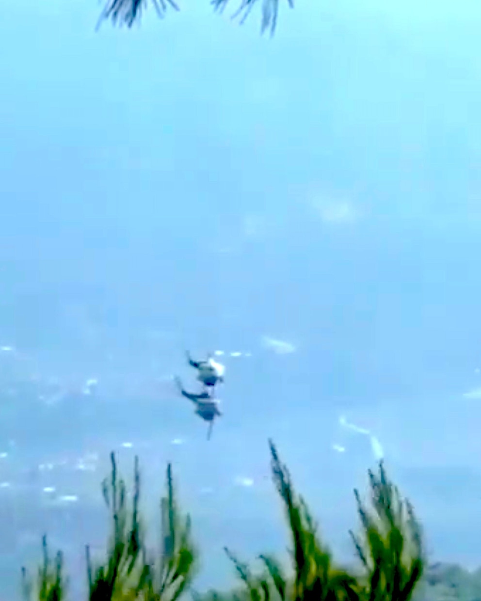 PHOTO: A bystander video showed two firefighting helicopters flying perilously close to each other before colliding in midair, Aug. 2, 2026, while battling a wildfire in Psatha in the Boeotia region of Greece, about 45 miles northwest of Athens.