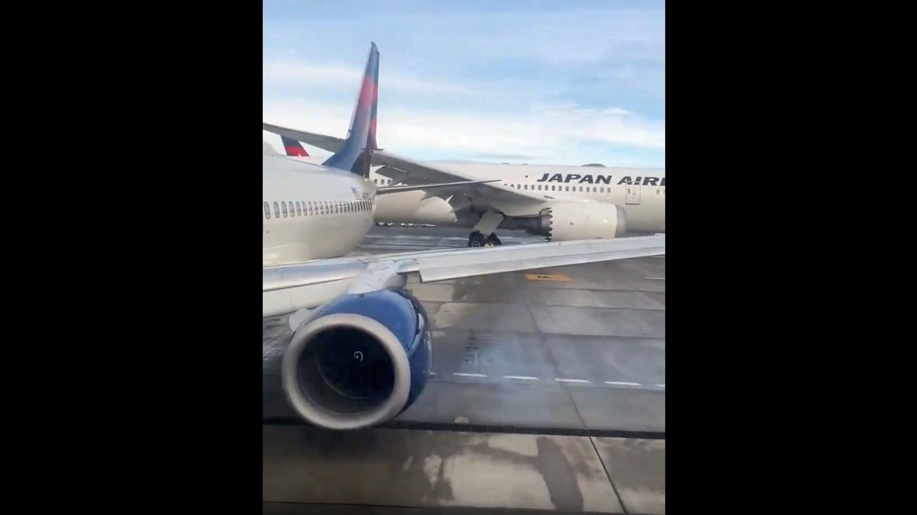 Japan Airlines flight hits tail of parked Delta plane at Seattle